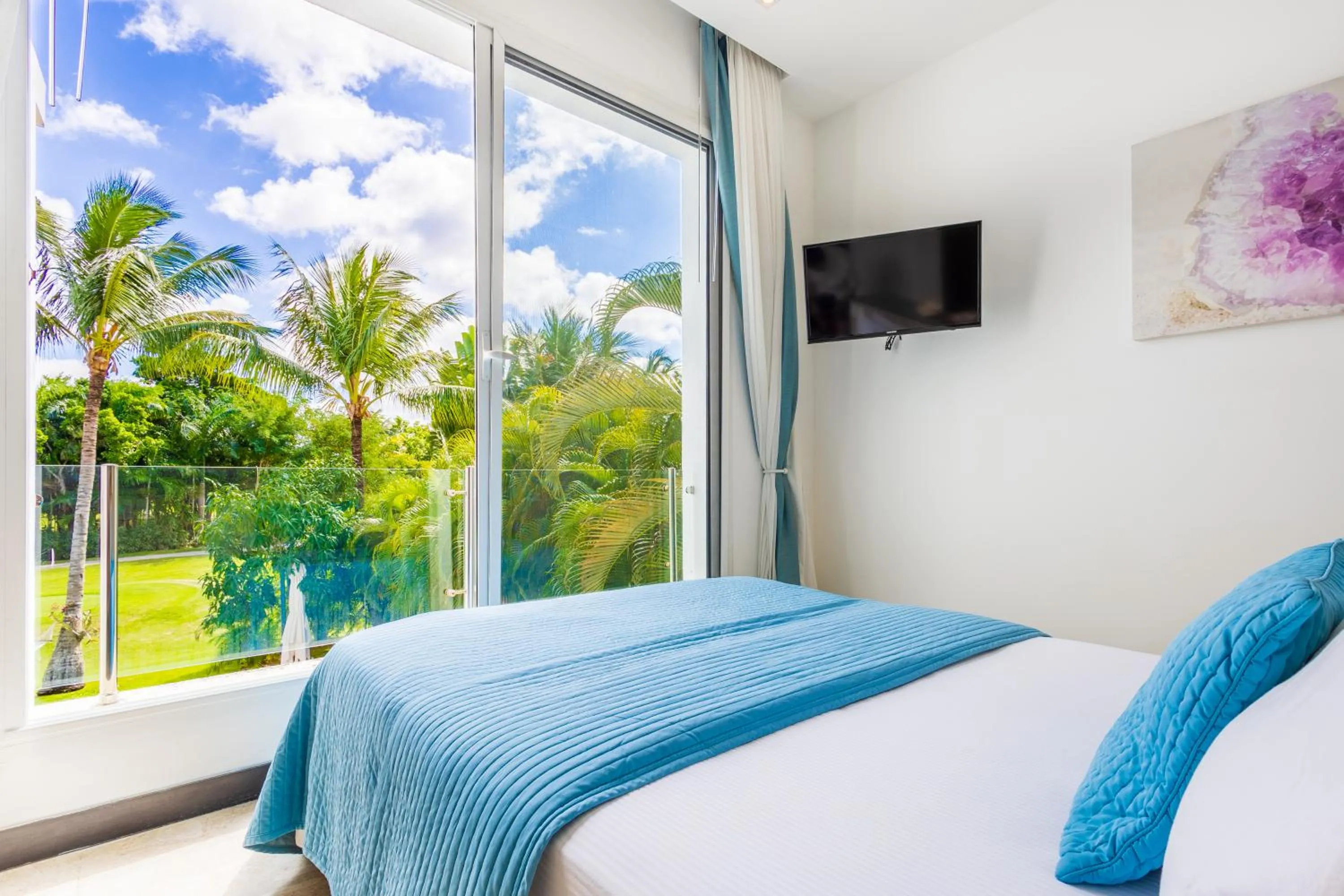 Bed in Luxury Rentals in Punta Cana - Exclusive Waterfall Villa with Private Pool, BBQ, Maid, Golf