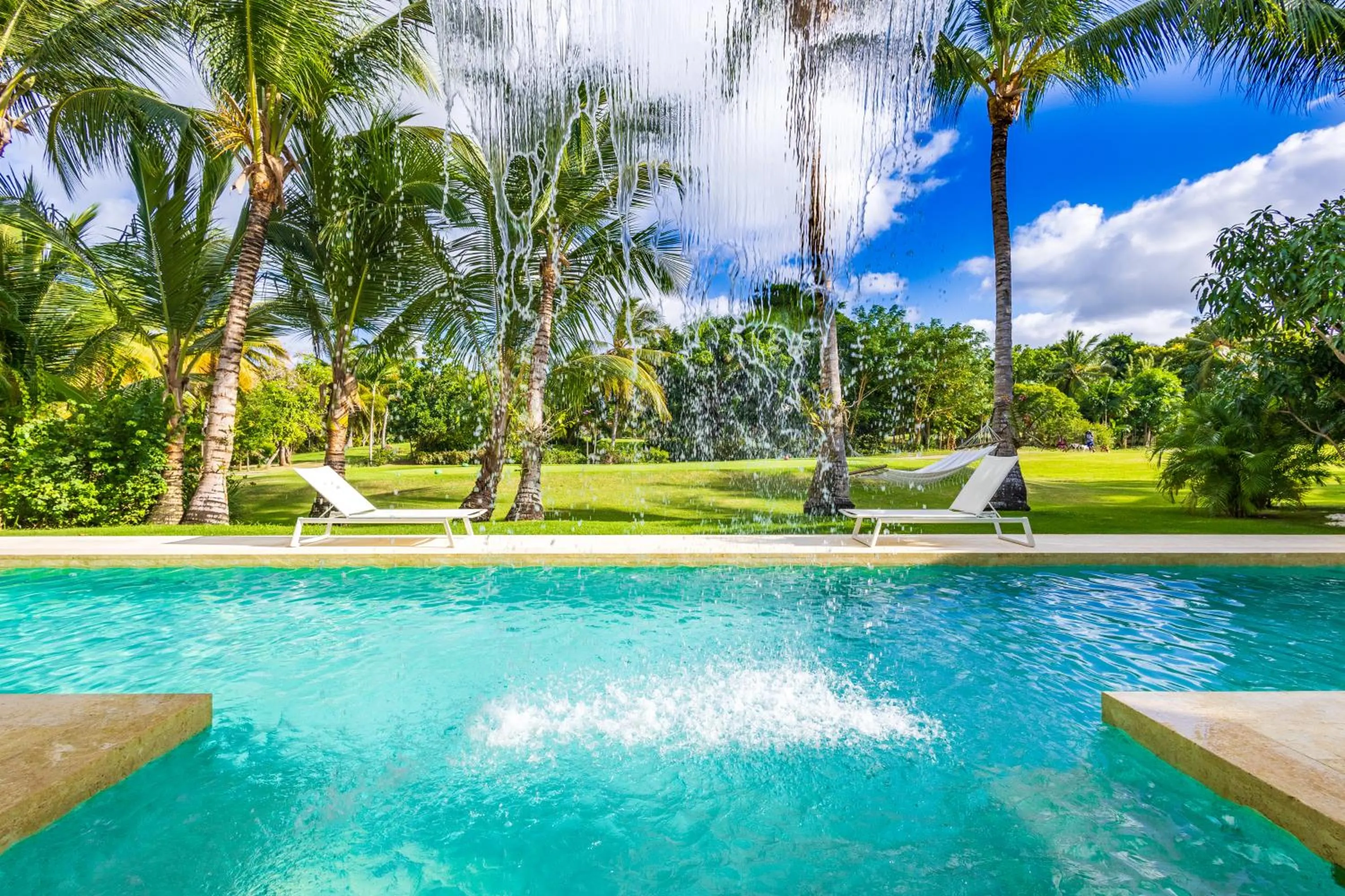 Property building in Luxury Rentals in Punta Cana - Exclusive Waterfall Villa with Private Pool, BBQ, Maid, Golf