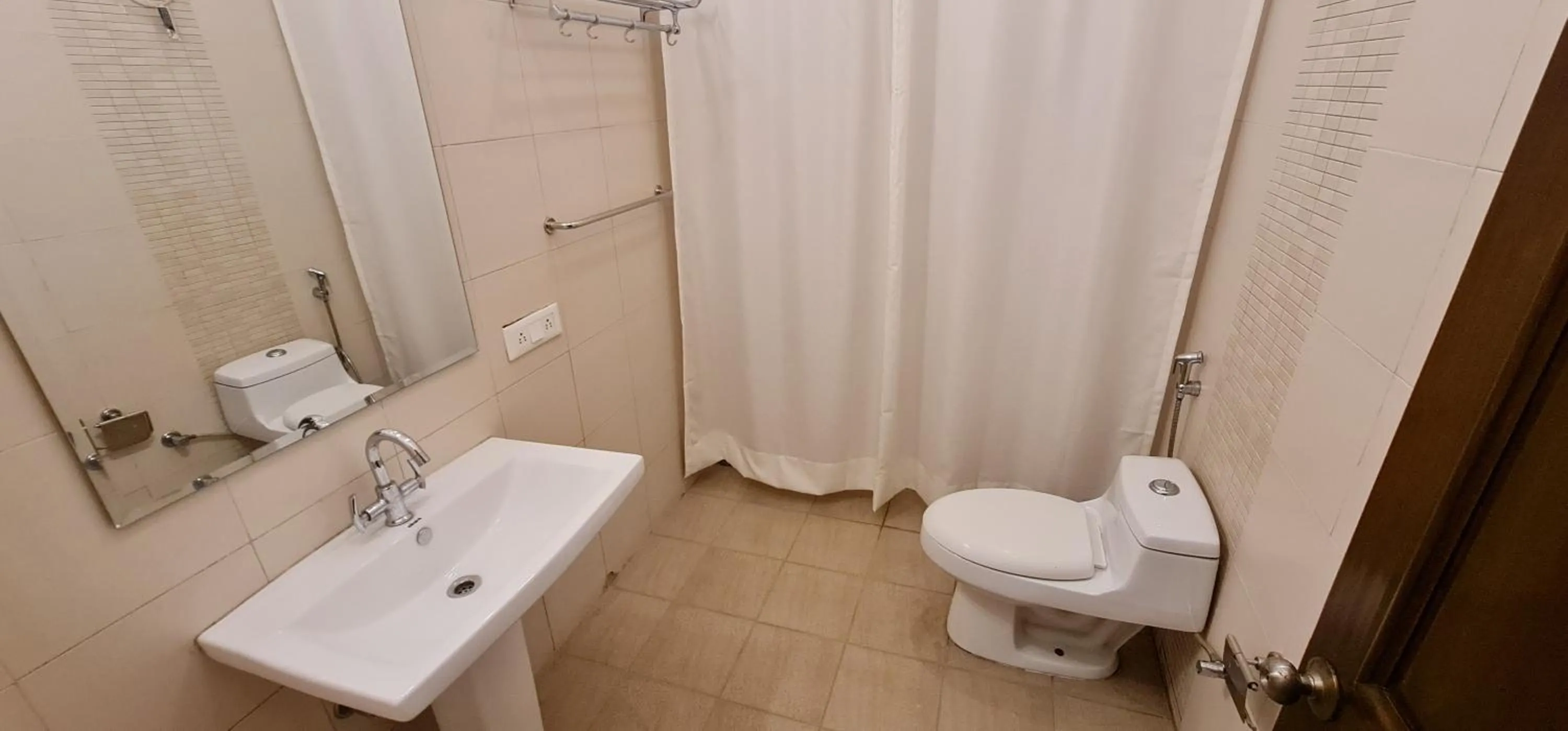 Nook Inn & Suites - MG ROAD METRO