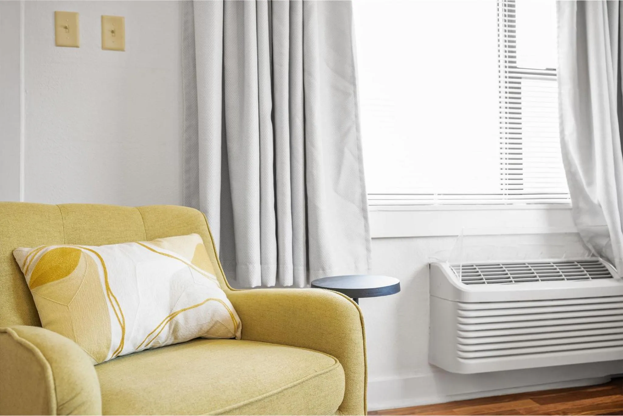 Living room in The Flats on Florida St - Super Comfy 2-Bedroom Apartments