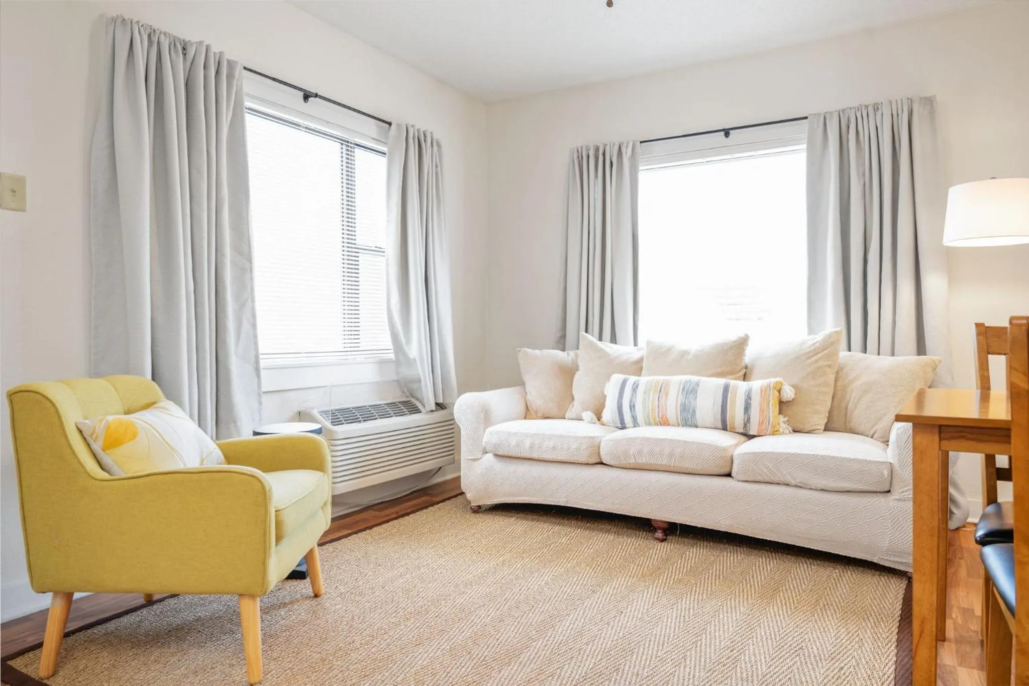 Living room in The Flats on Florida St - Super Comfy 2-Bedroom Apartments