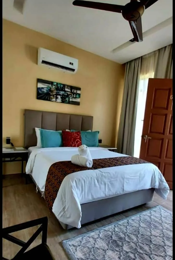 Bed in Cinta Abadi Resort