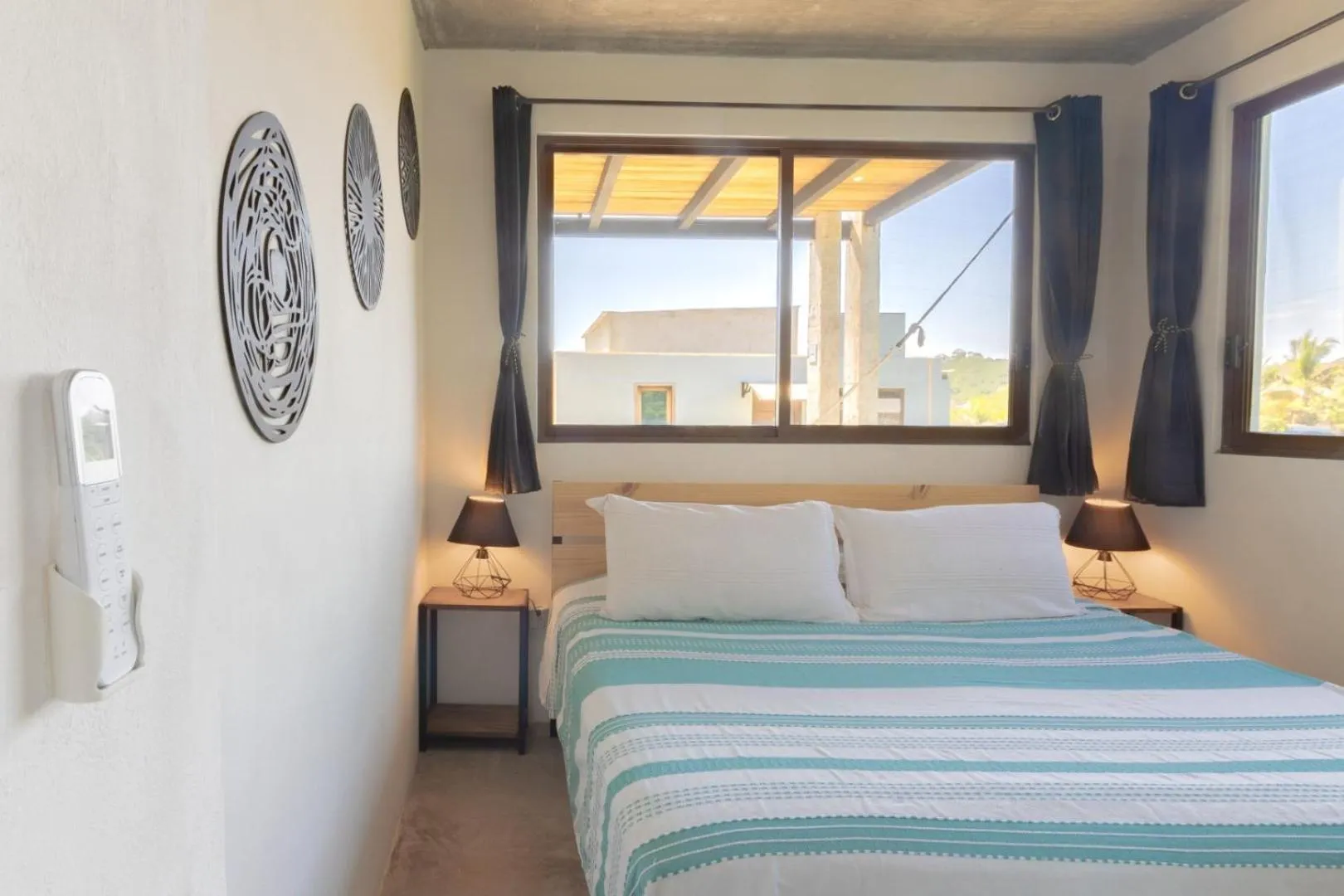 Bed in Casa Mauna Boutique Hotel