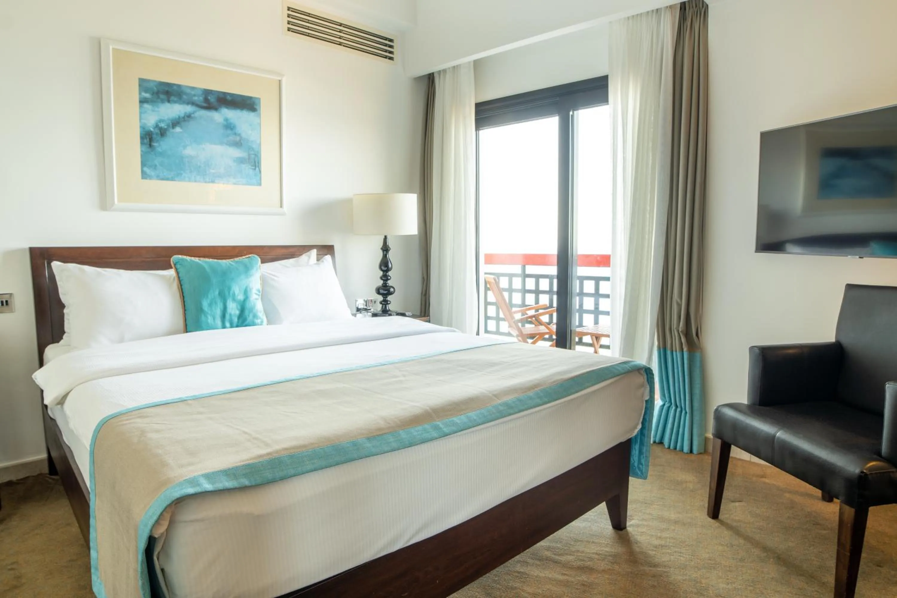 Bed in Arkin Palm Beach Hotel