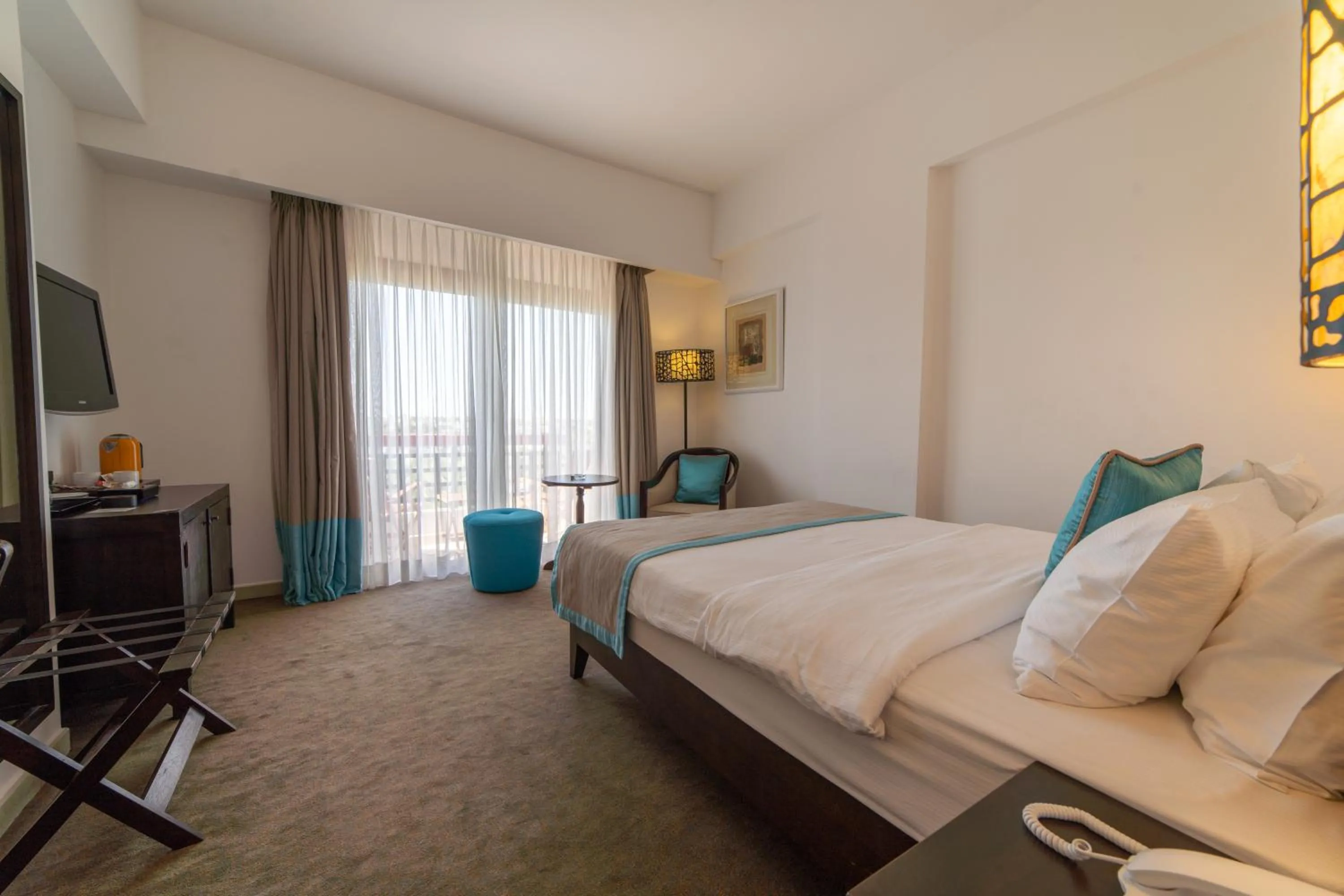 Bed in Arkin Palm Beach Hotel