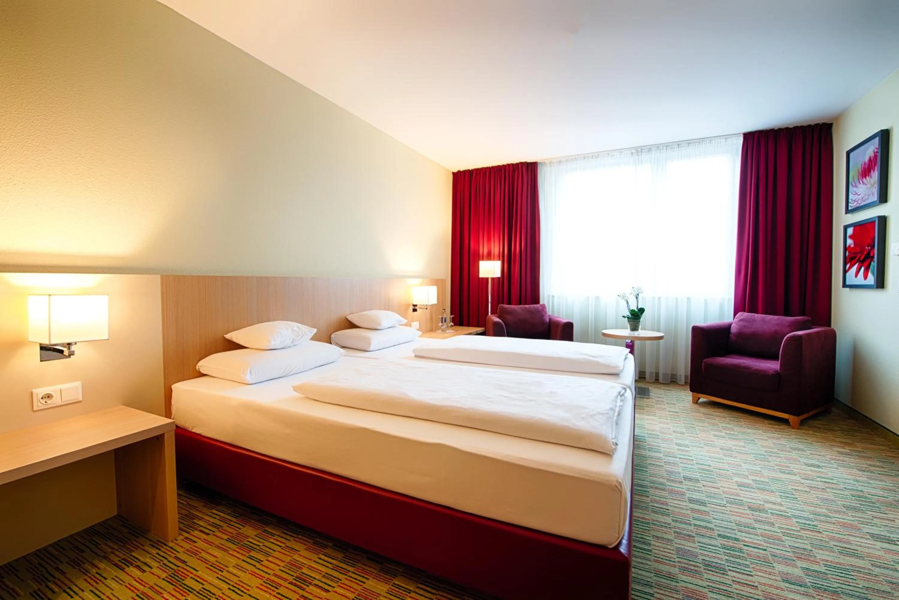 Photo of the whole room, Bed in Welcome Hotel Paderborn