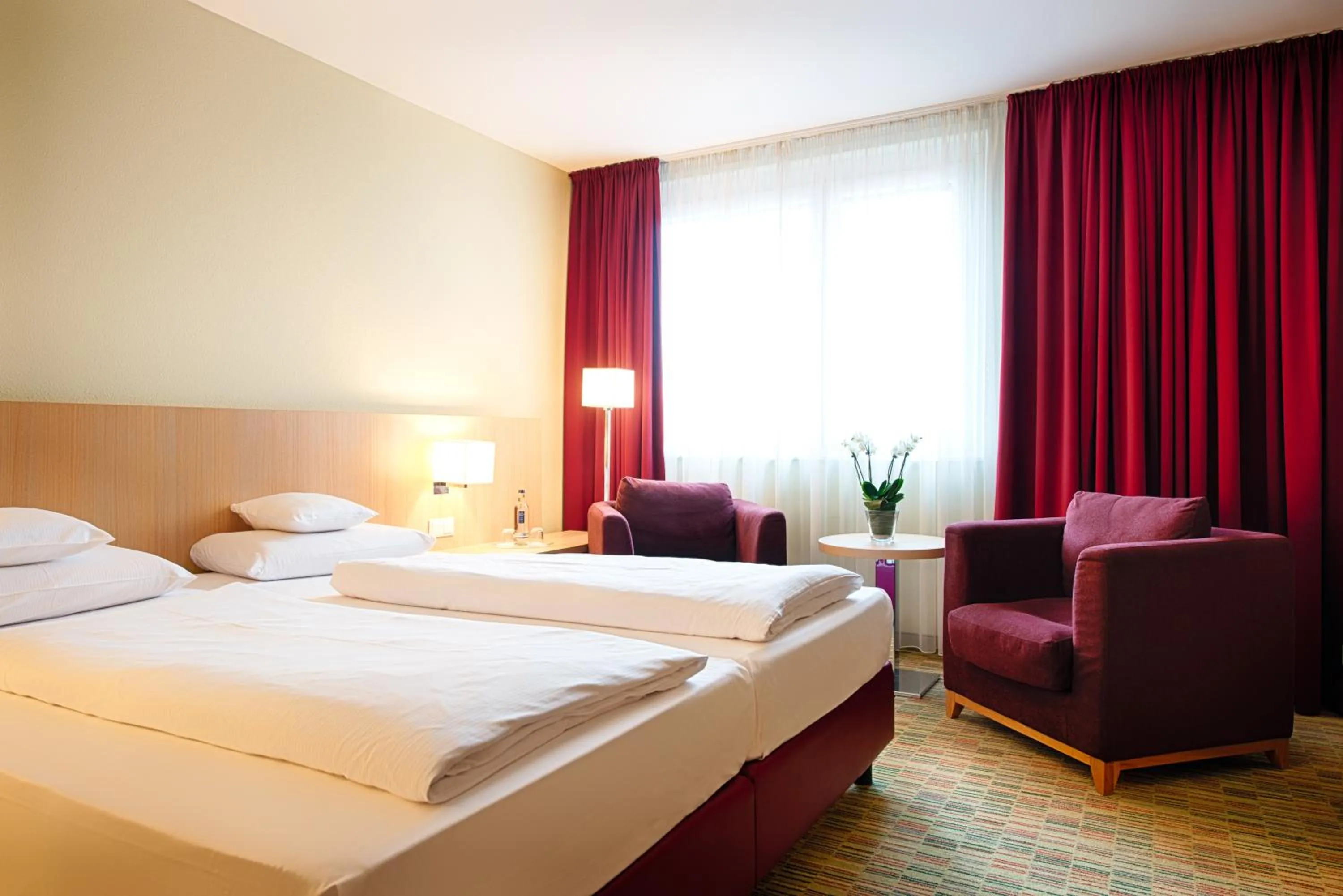 Photo of the whole room, Bed in Welcome Hotel Paderborn