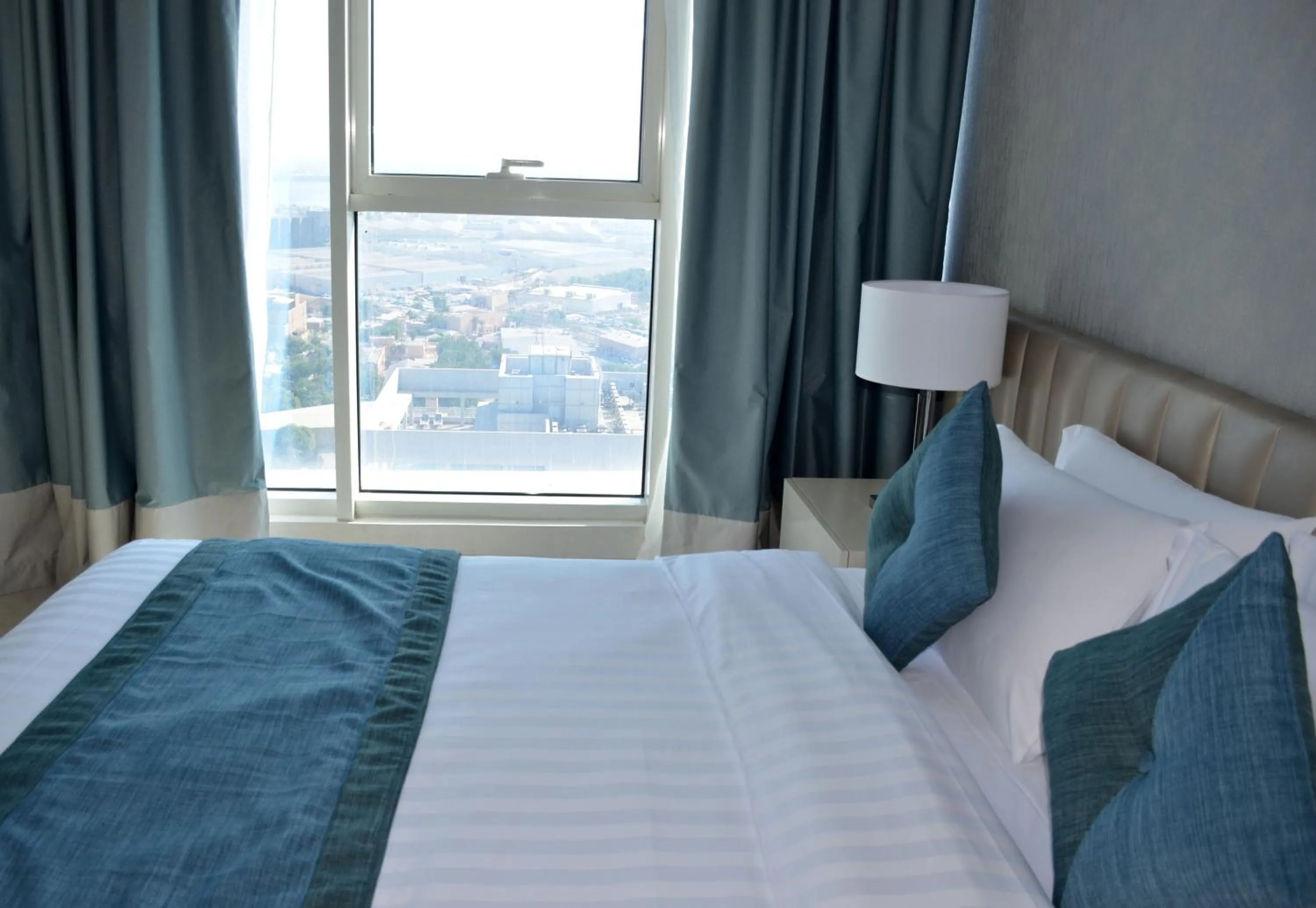 Bed in The Lodge Suites