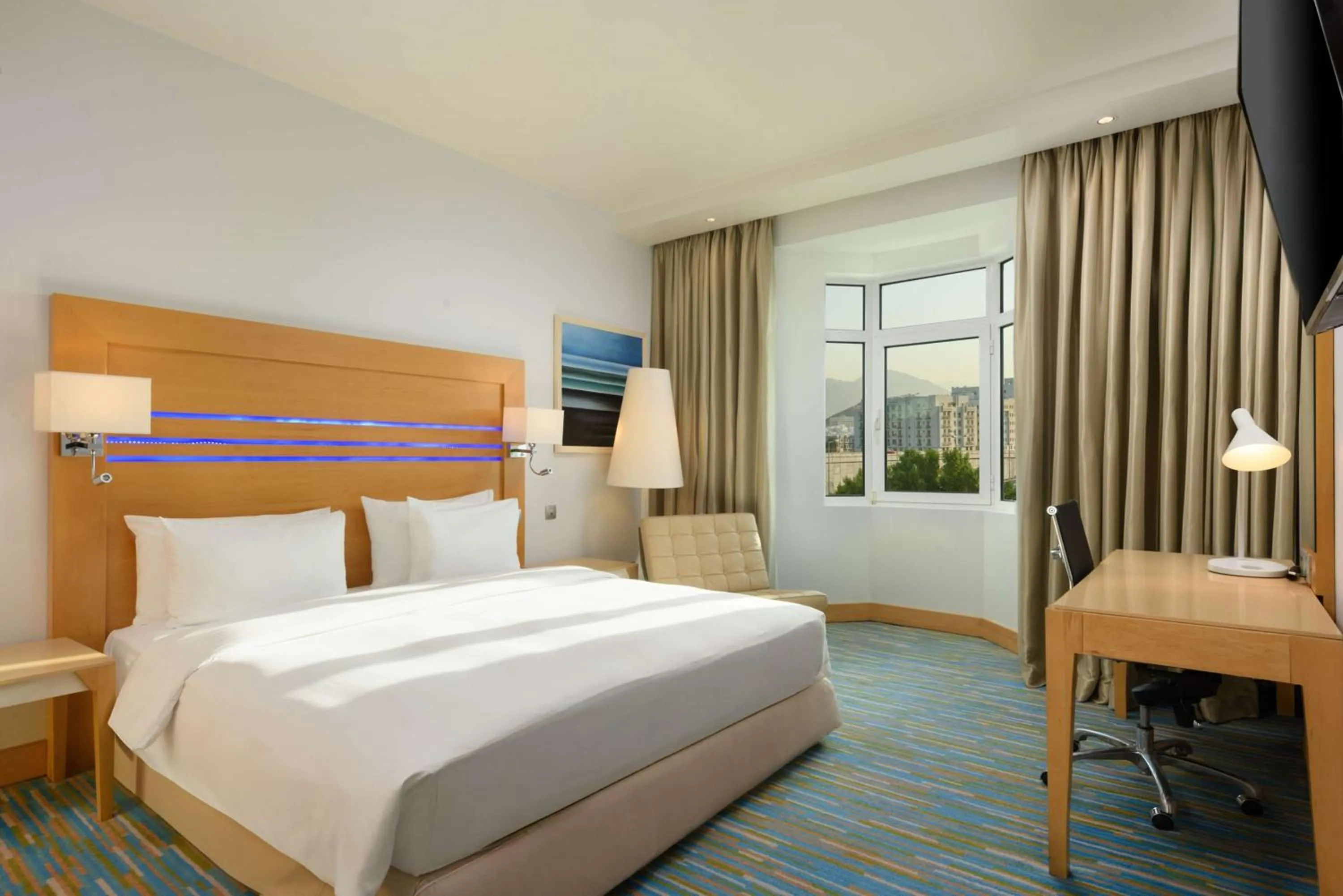 Photo of the whole room, Bed in Radisson Blu Hotel, Muscat