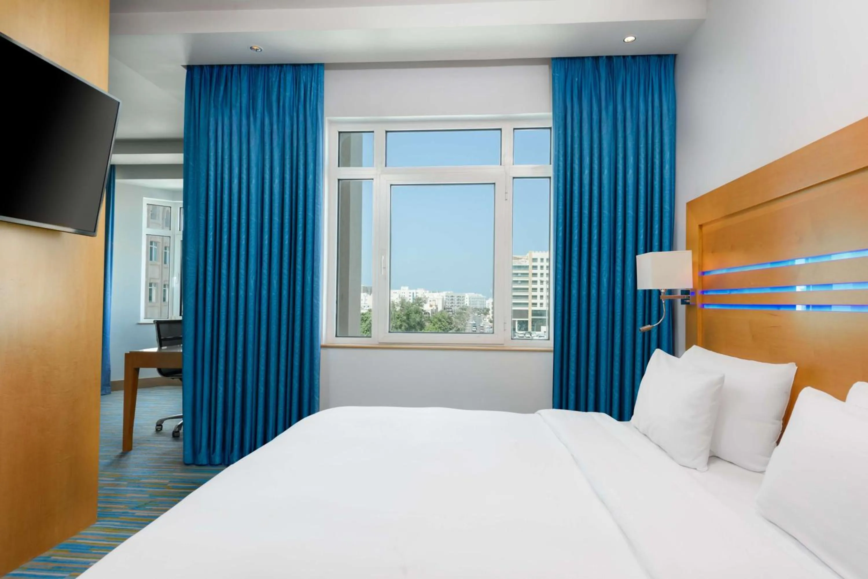 Photo of the whole room, Bed in Radisson Blu Hotel, Muscat