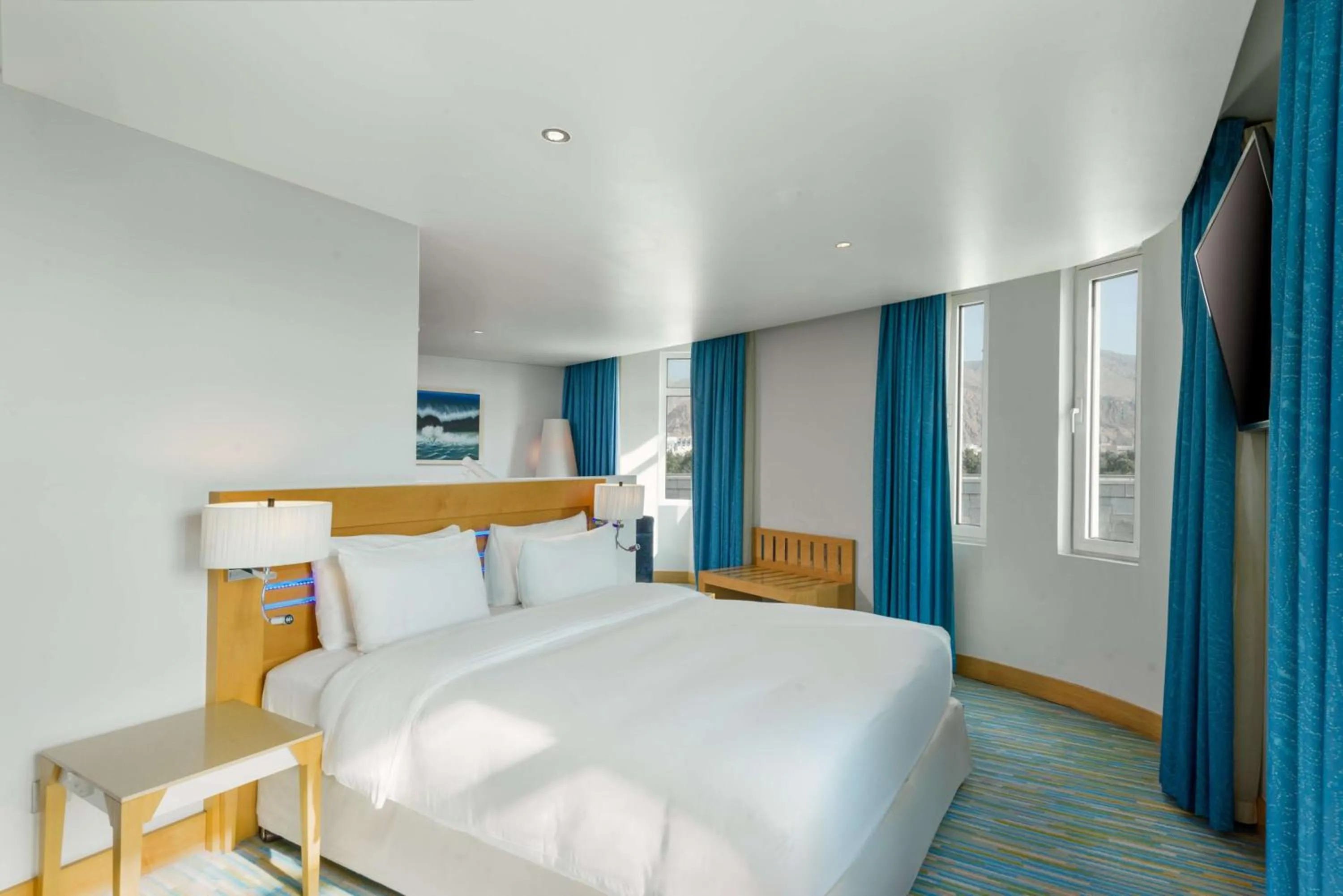 Photo of the whole room, Bed in Radisson Blu Hotel, Muscat