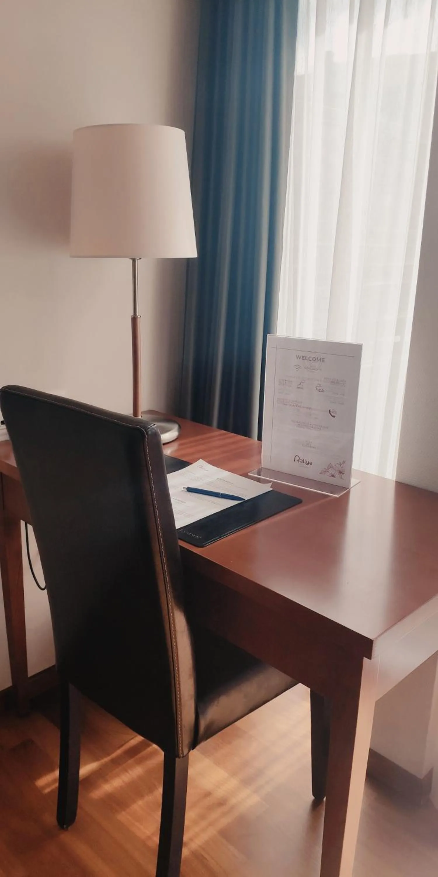 Bedroom in Hôtel Rallye & Entrées aux Bains de la Gruyère