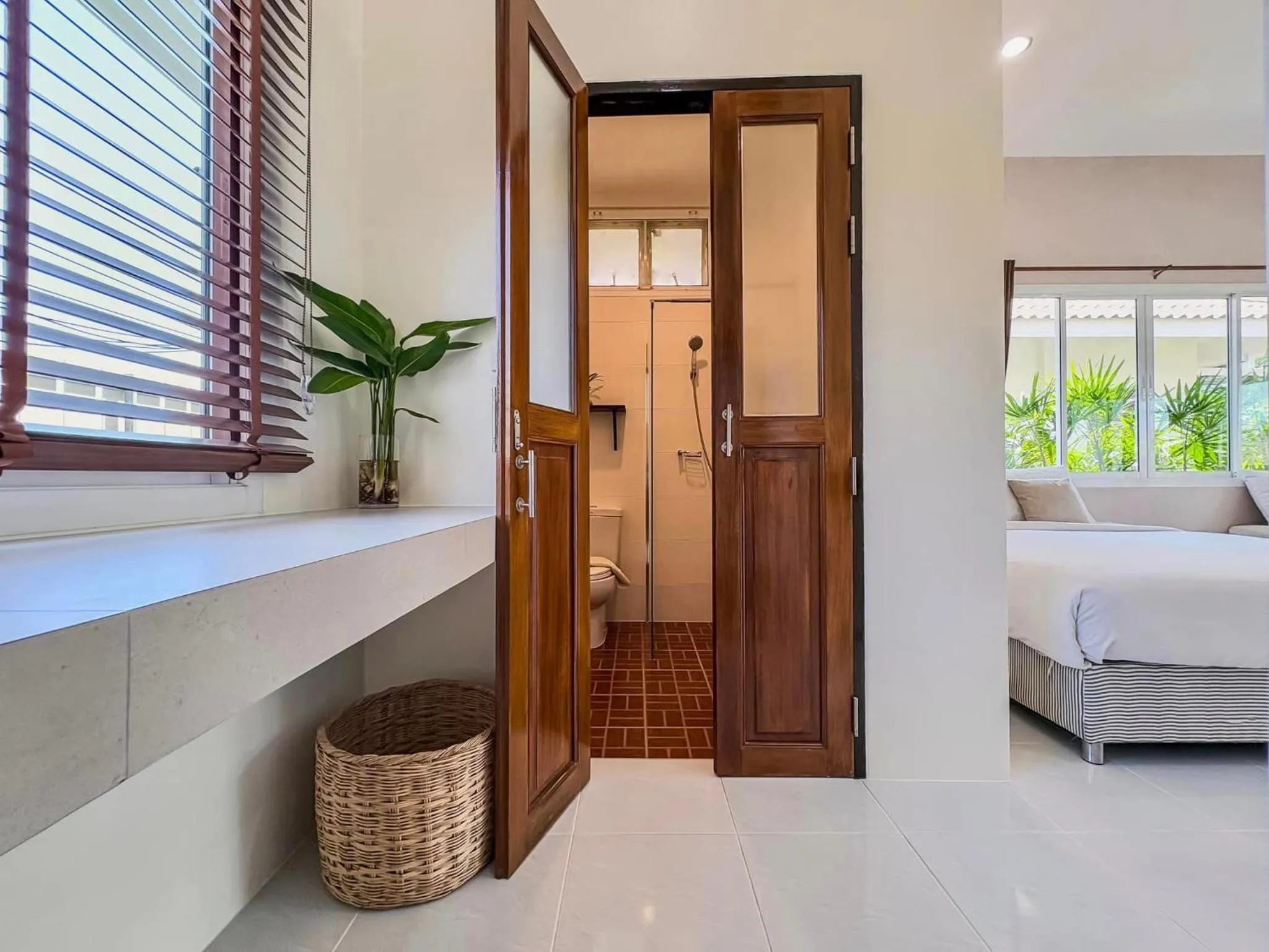 Bed in Nisasiri Boutique Resort