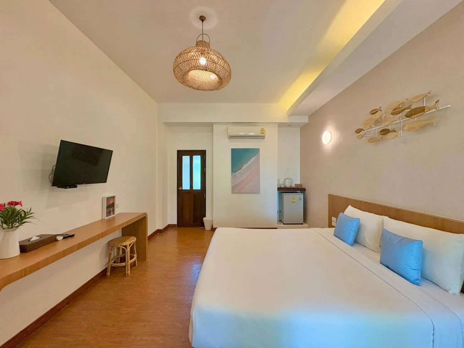 Bed in Nisasiri Boutique Resort