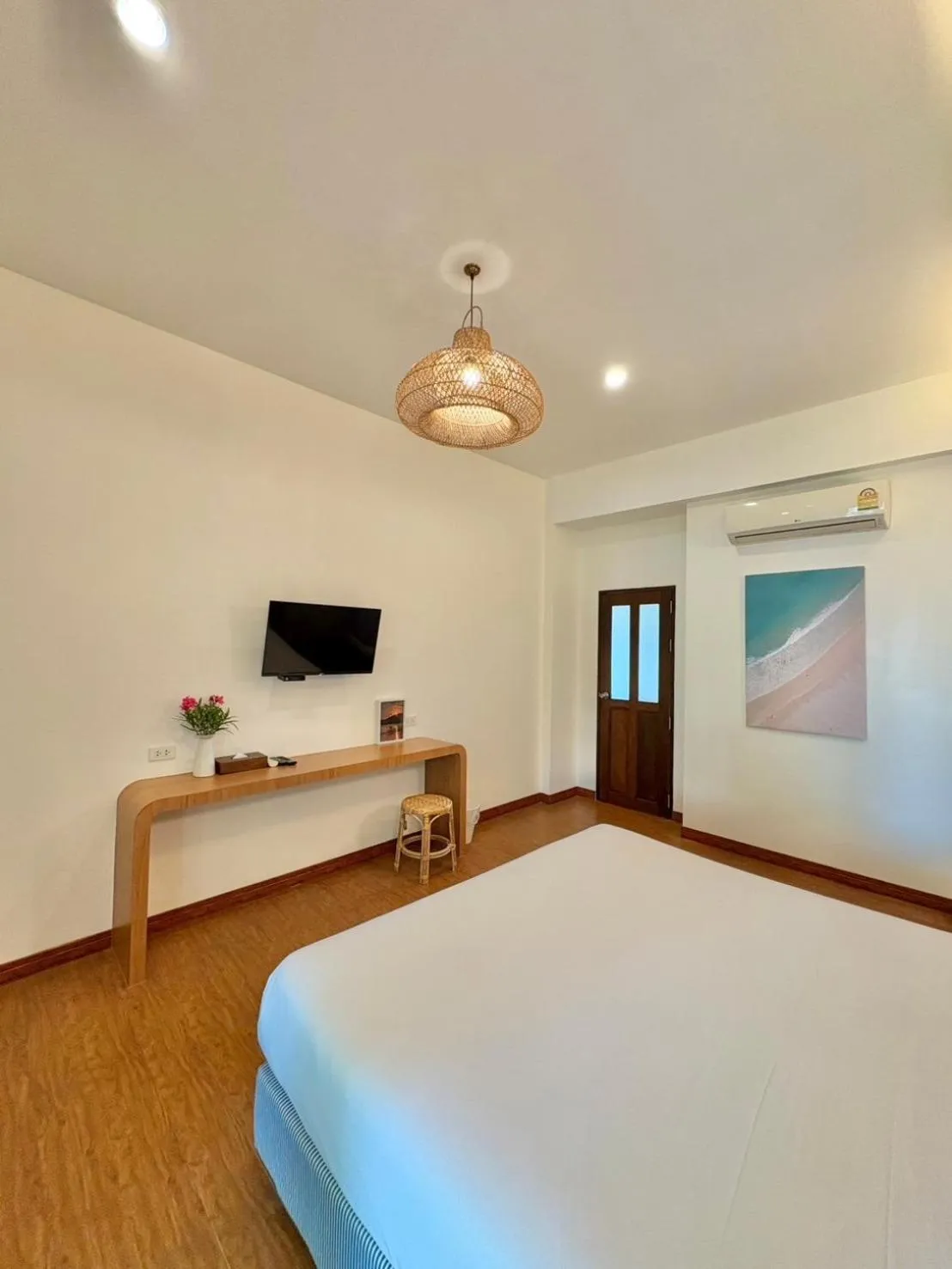Bed in Nisasiri Boutique Resort