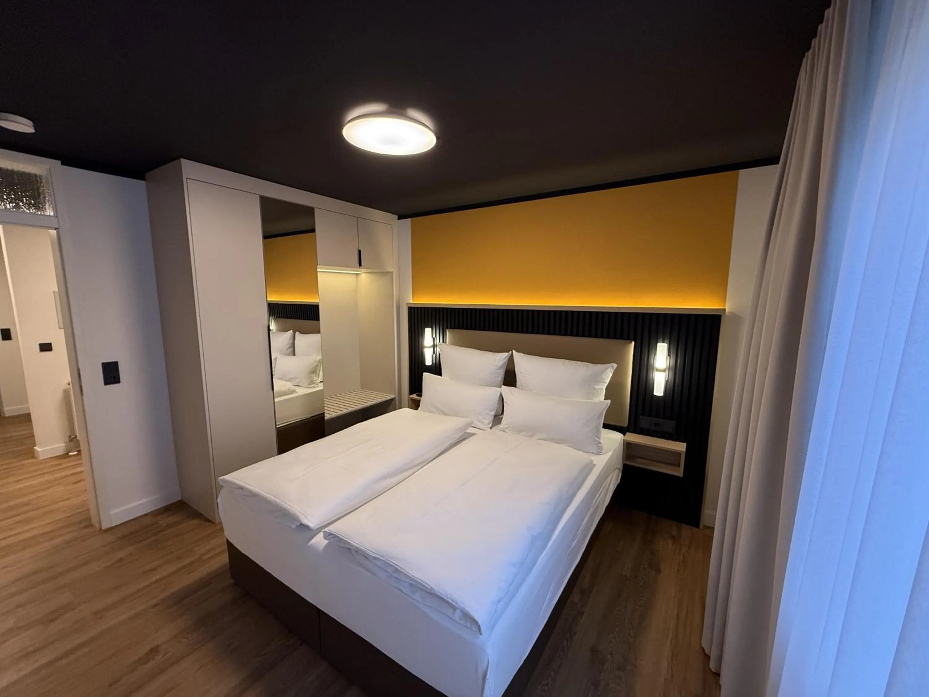 Bedroom, Bed in Residenzhotel Stuttgart Airport, Sure Hotel Collection by Best Western
