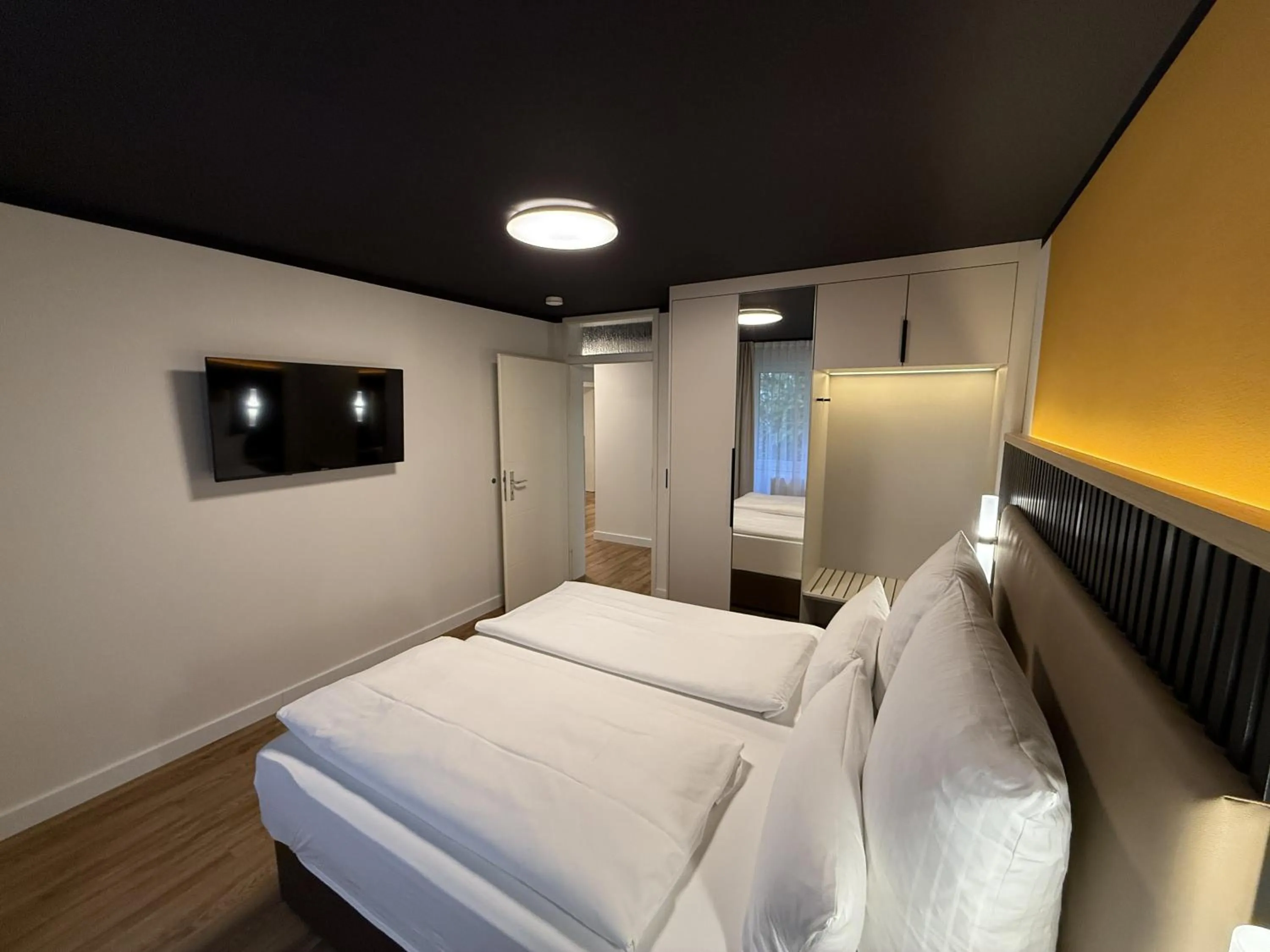 Bedroom, Bed in Residenzhotel Stuttgart Airport, Sure Hotel Collection by Best Western