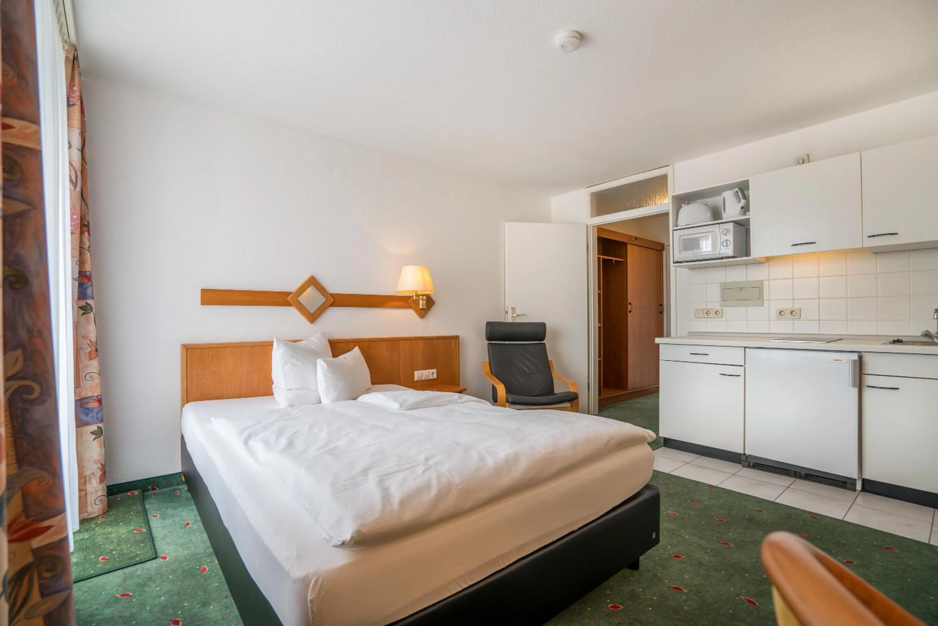 Photo of the whole room, Bed in Apartmenthotel Residenz Steinenbronn