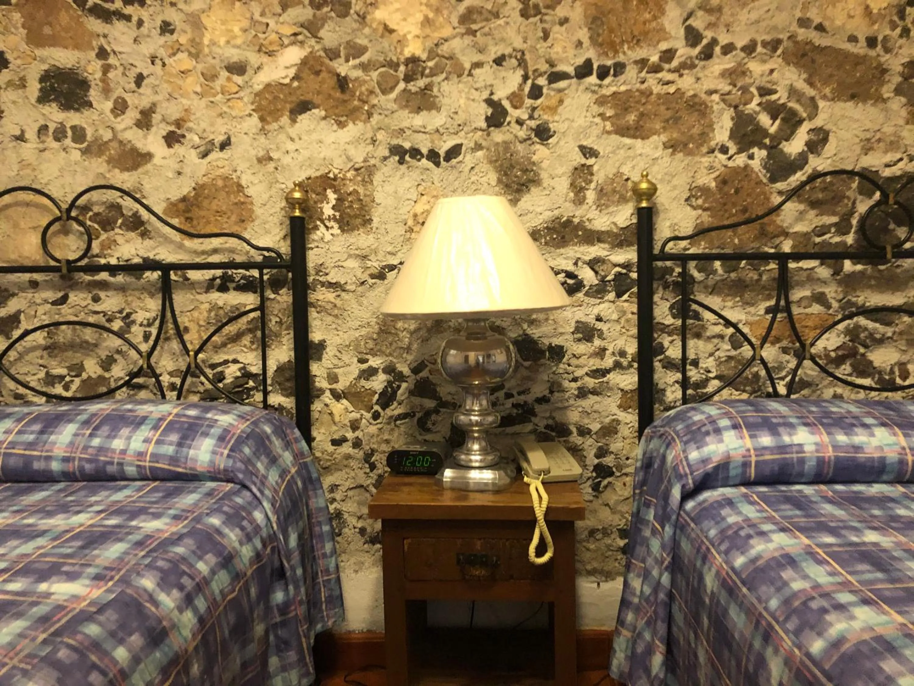 Bed in Hotel Mansión Virreyes by Rotamundos