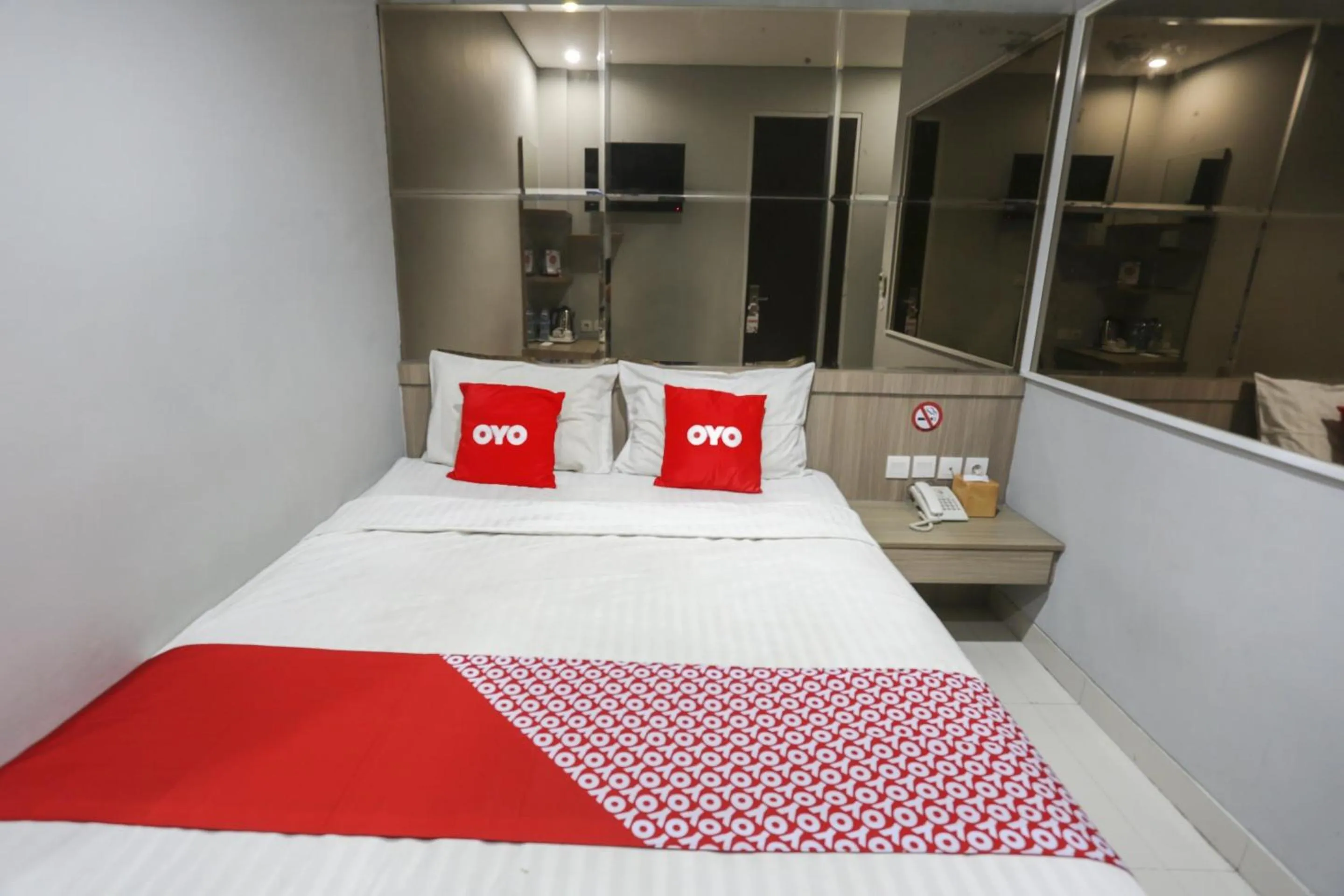 Bedroom in SUPER OYO Capital O 90056 Wisma Kebon Kacang 9