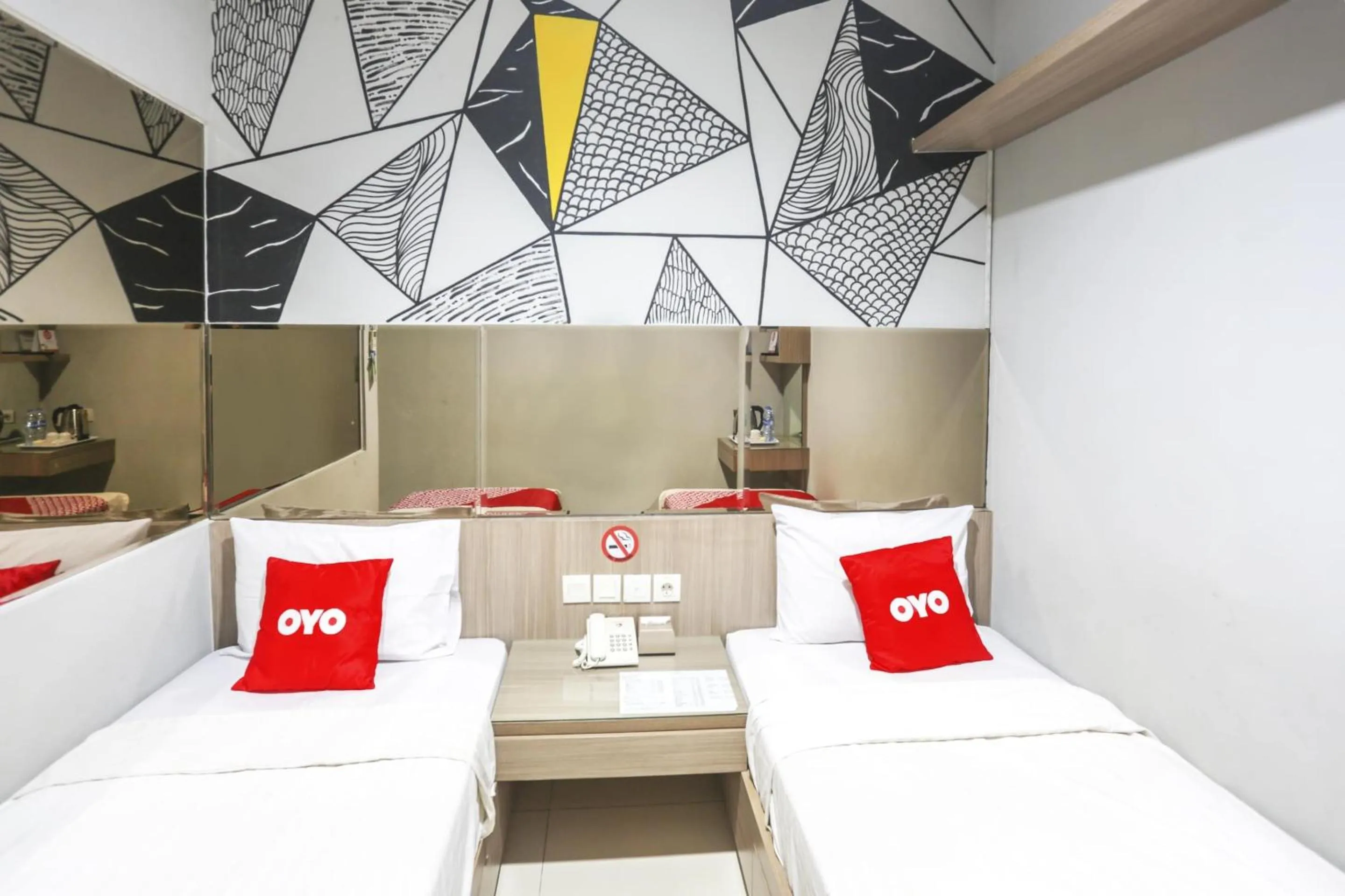 Bedroom in SUPER OYO Capital O 90056 Wisma Kebon Kacang 9