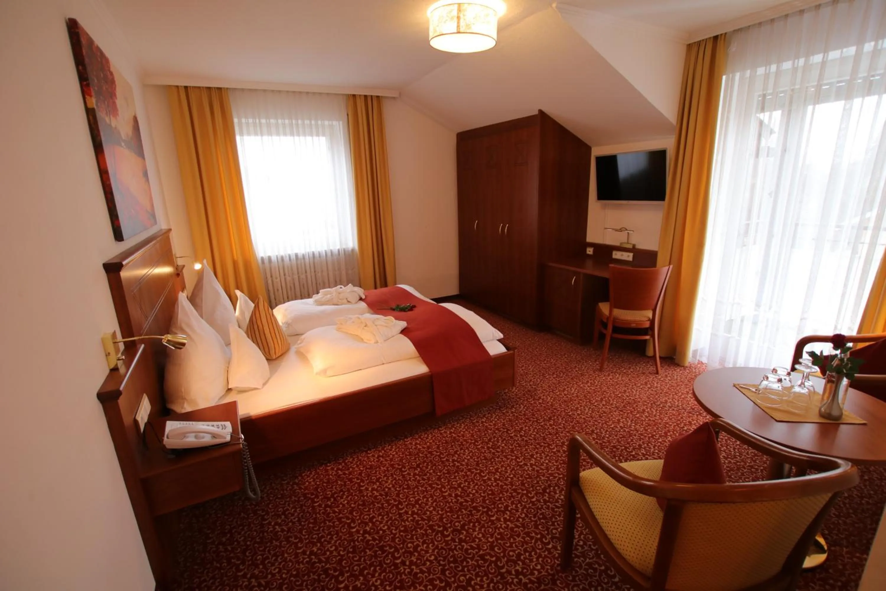Photo of the whole room, Bed in ANGERHOF Kur- und Thermenhotel