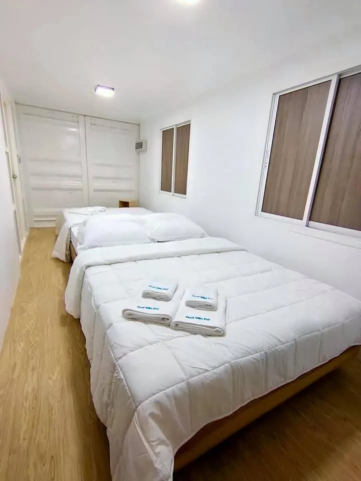 Bed in Pool Villa Banana House Pai