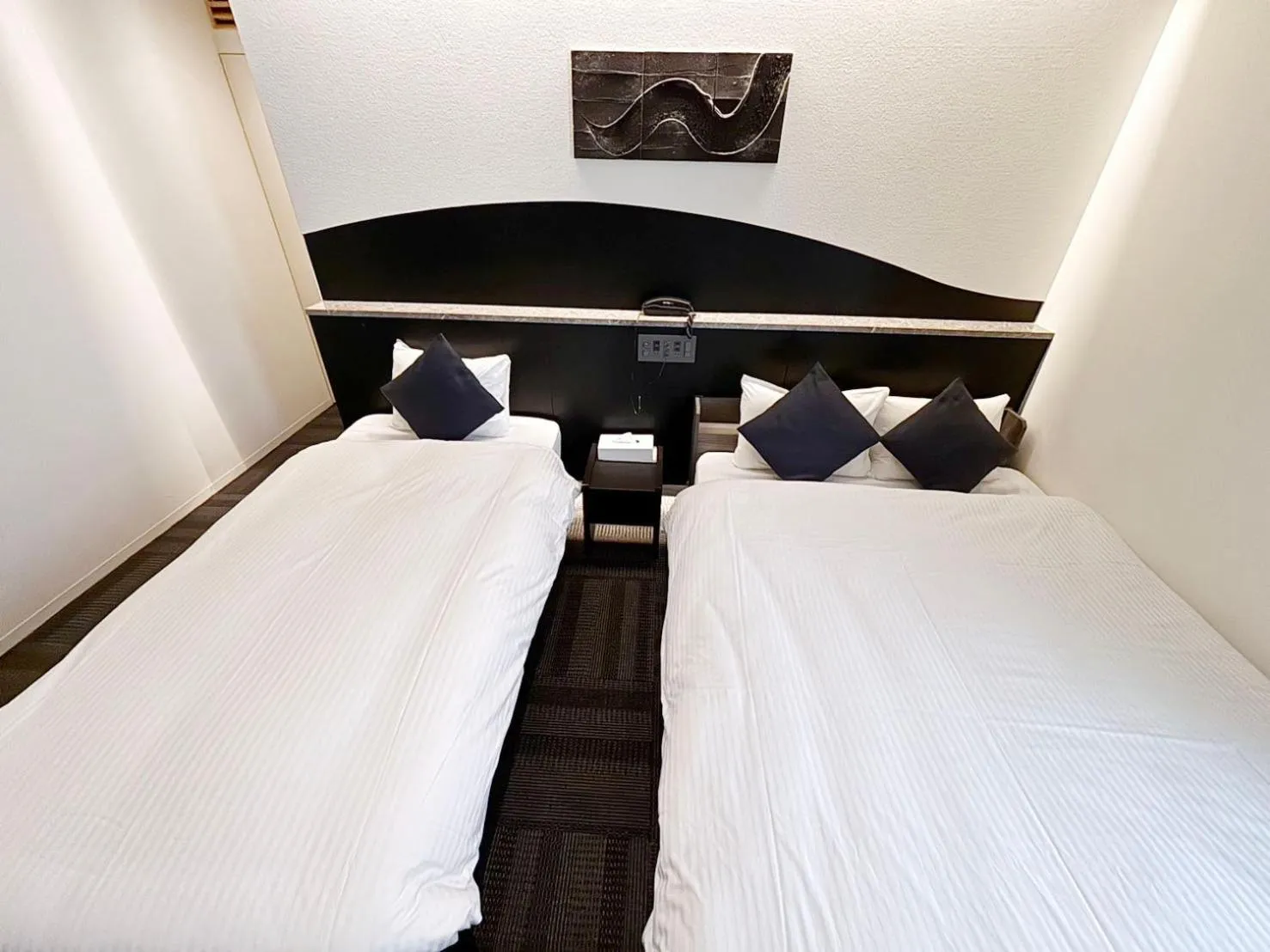 Bed in Seiei Hotel Kyoto Kawaramachi