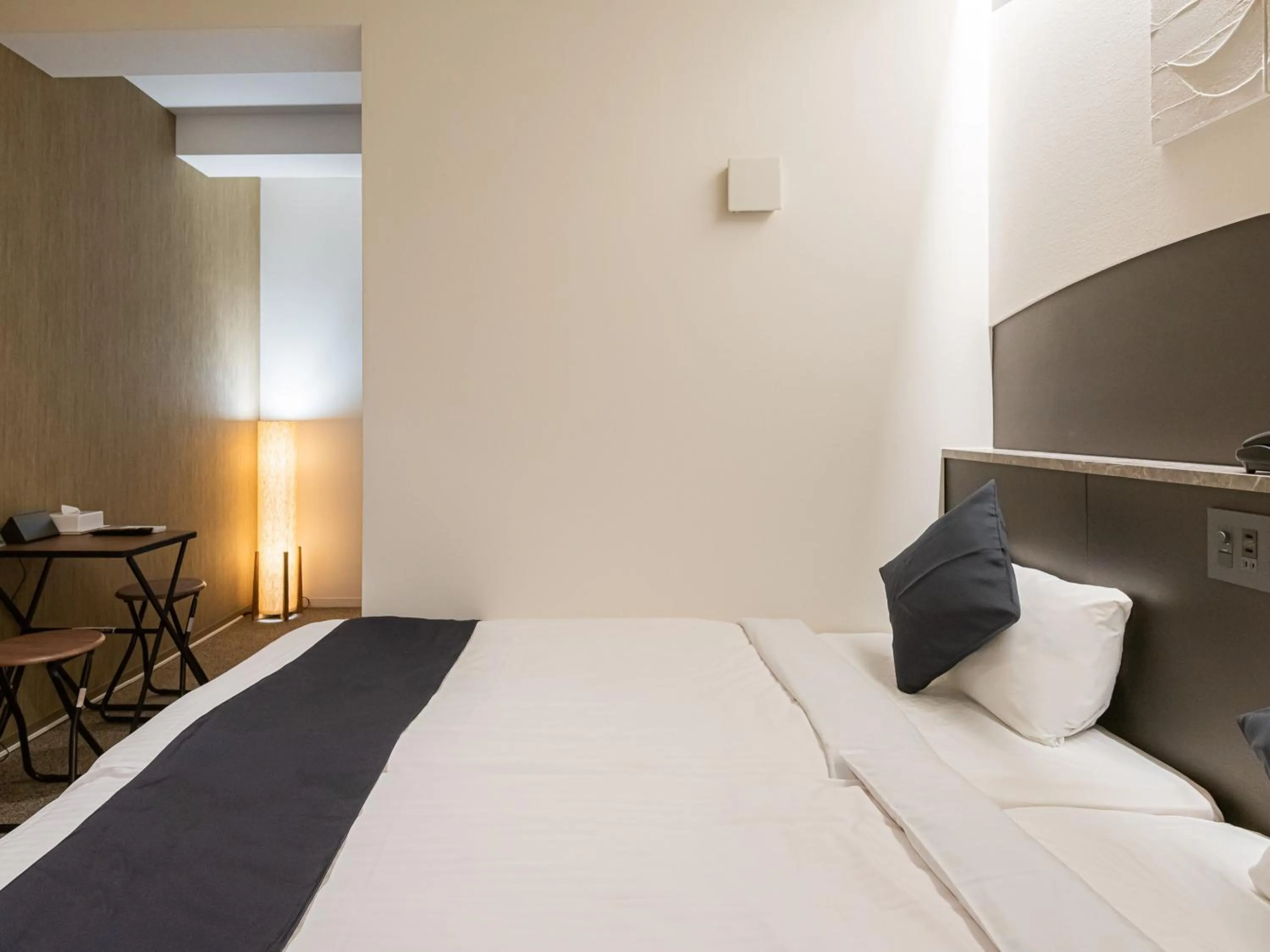 Bed in Seiei Hotel Kyoto Kawaramachi