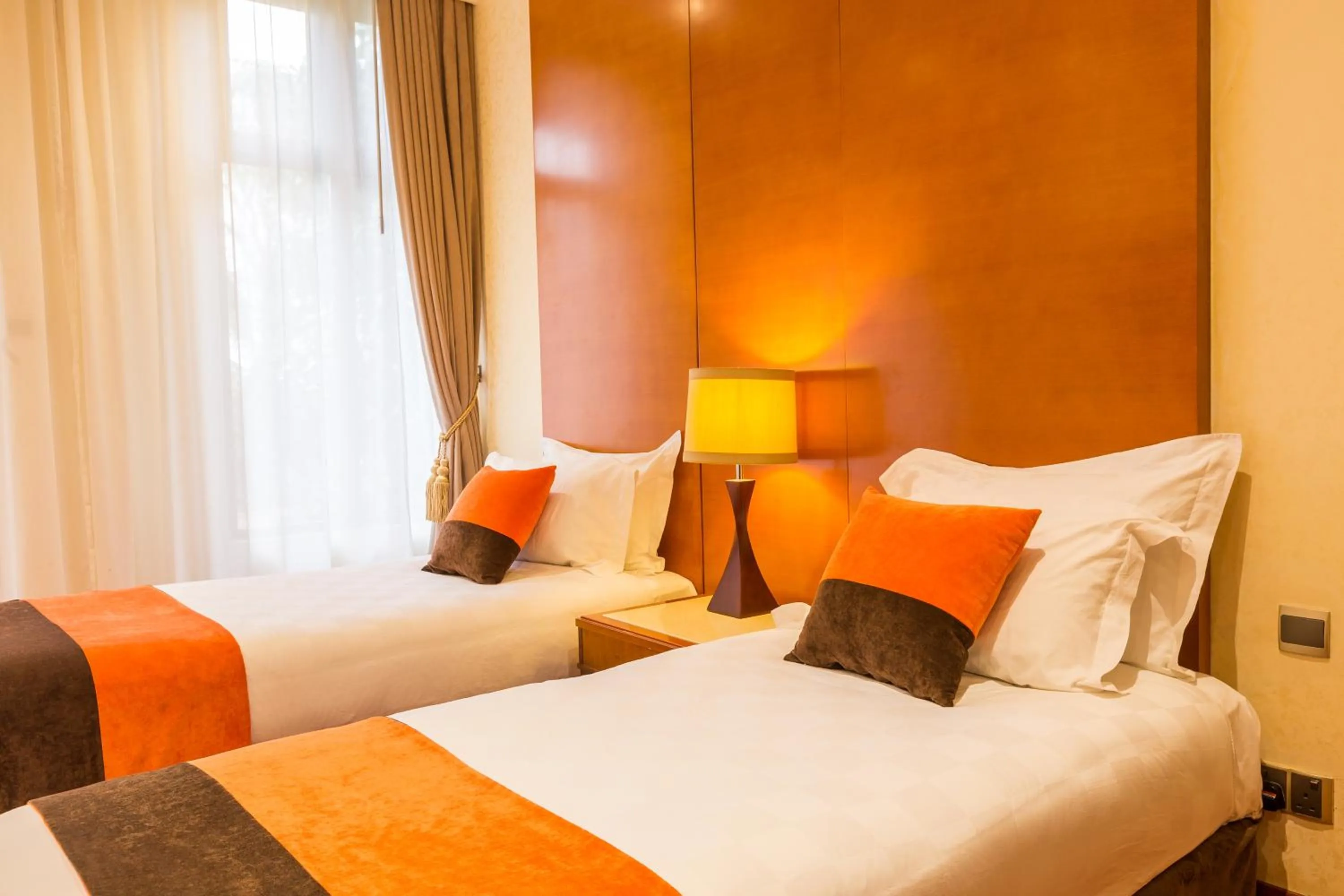 Bed in Alba Hotel Meru