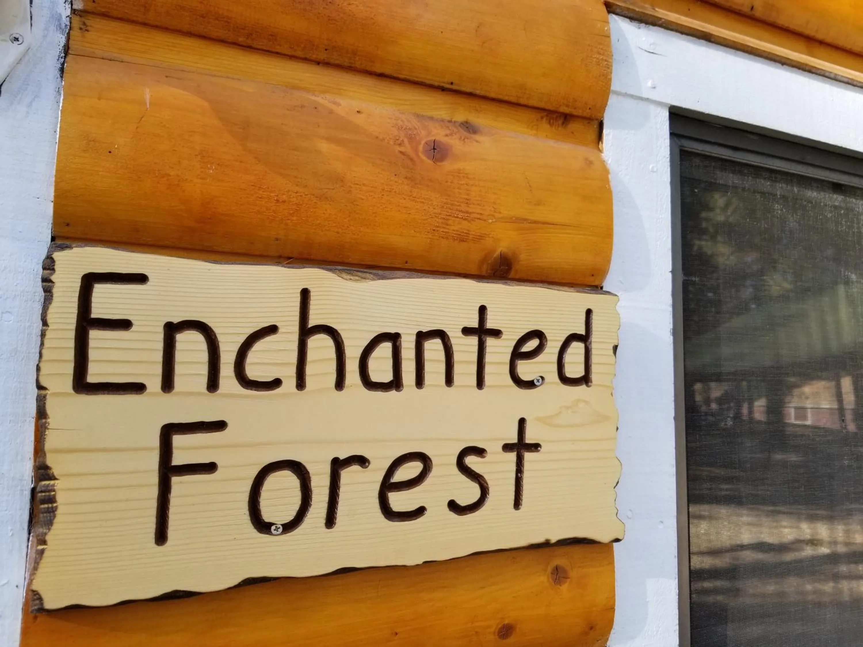 Property logo or sign in Grey Squirrel Resort