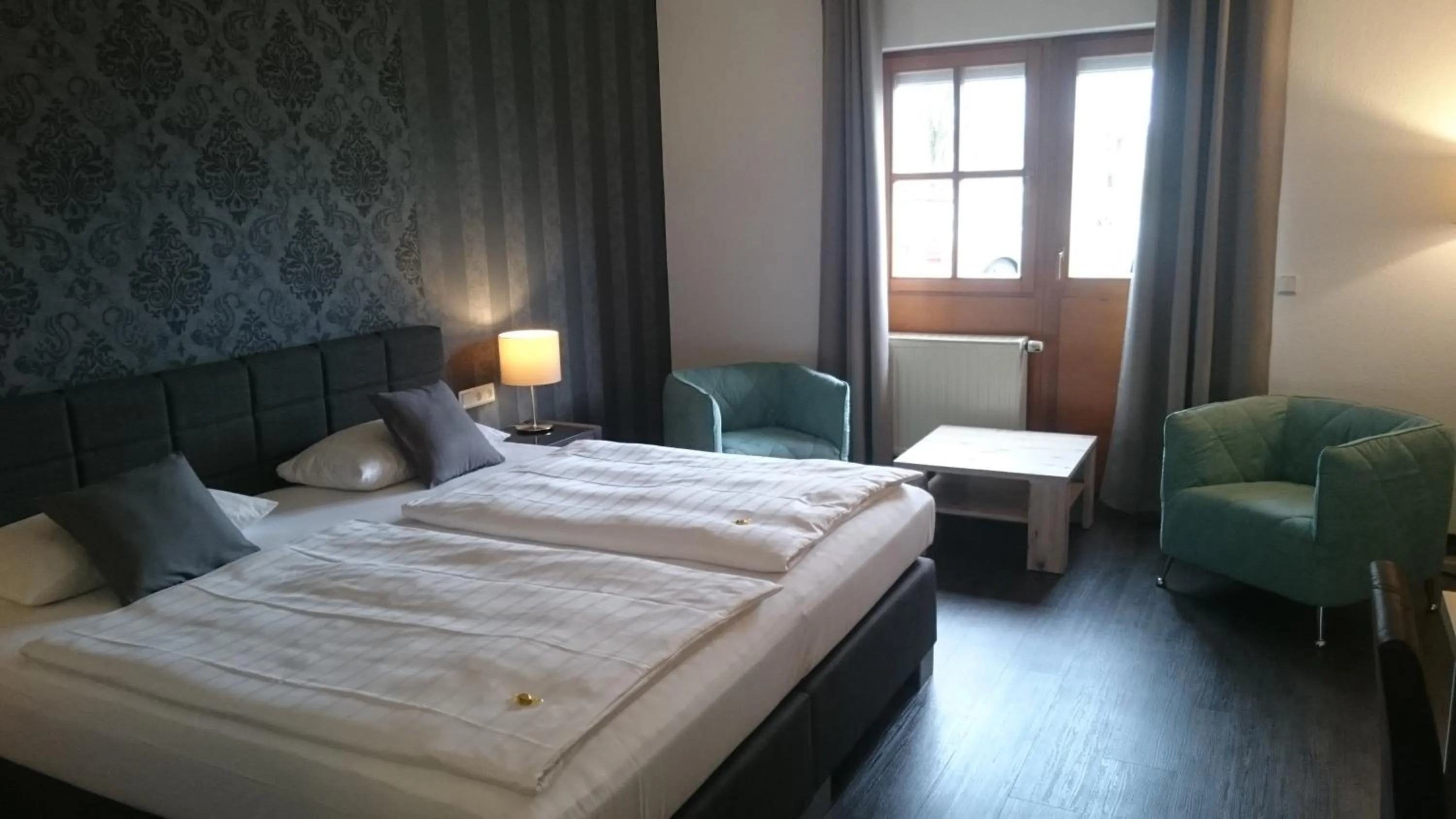 Photo of the whole room, Bed in Seehotel Losheim