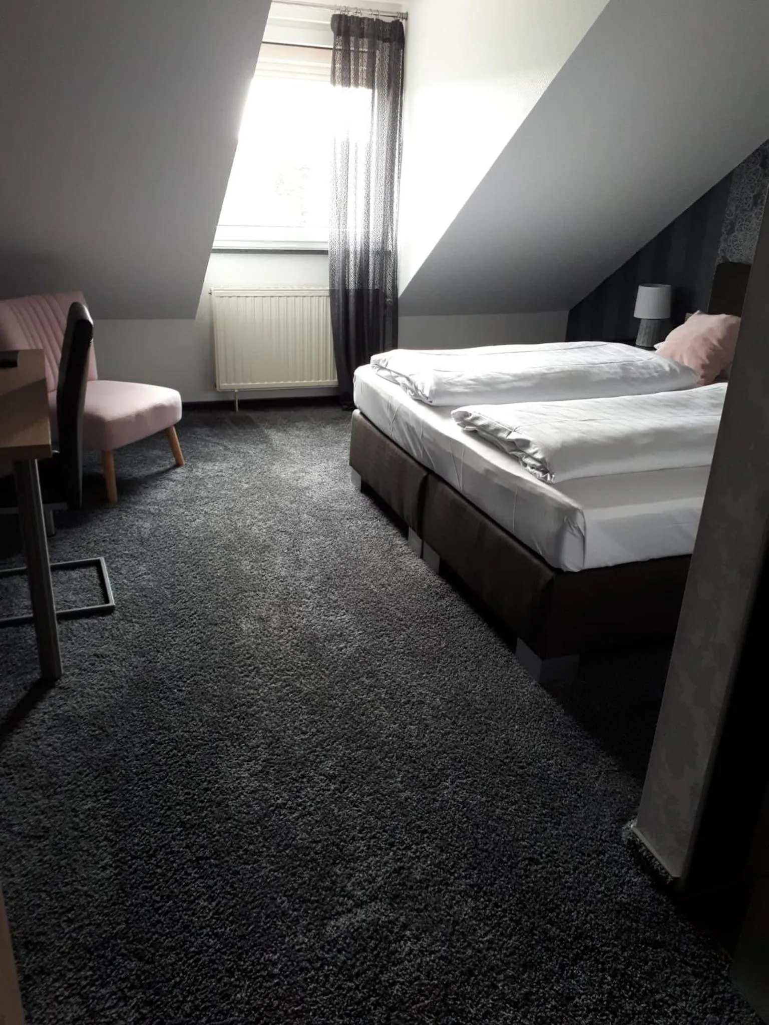 Photo of the whole room, Bed in Seehotel Losheim