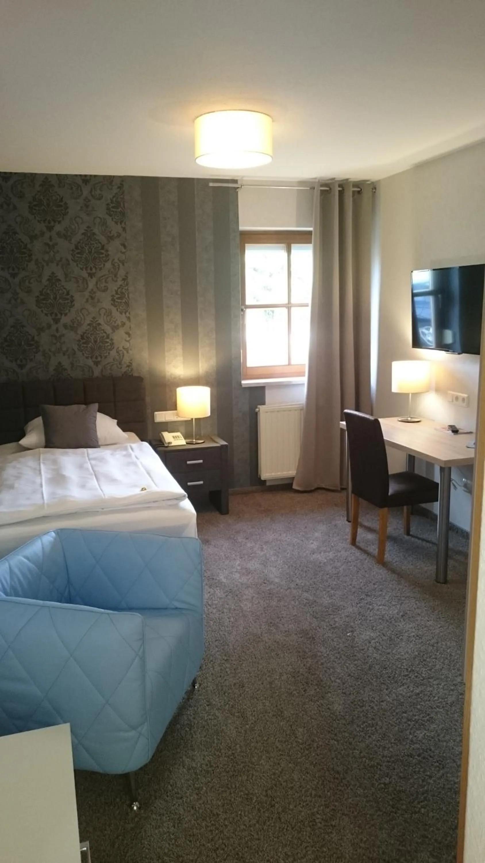 Photo of the whole room, Bed in Seehotel Losheim