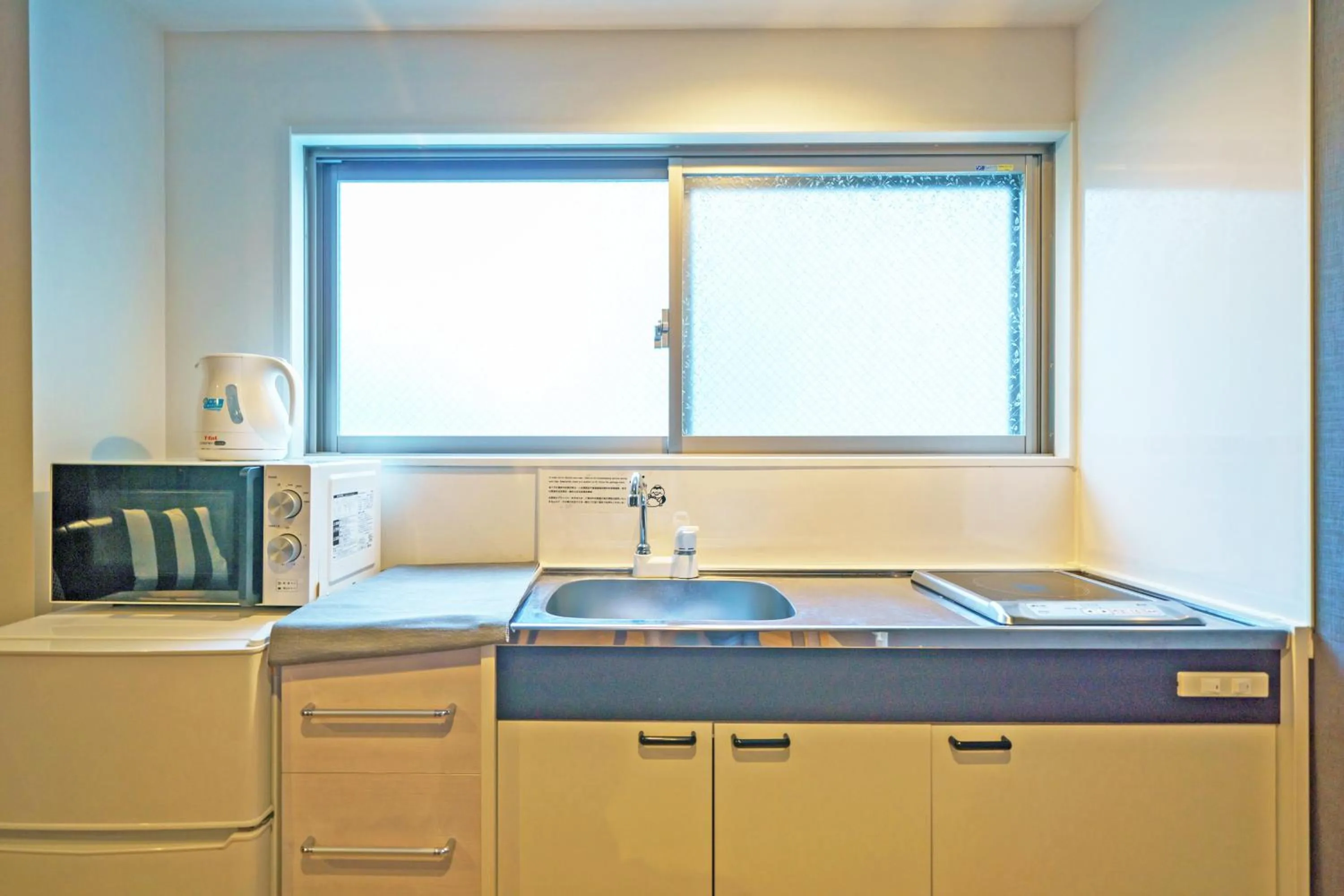Kitchen or kitchenette in Gracia Hotel