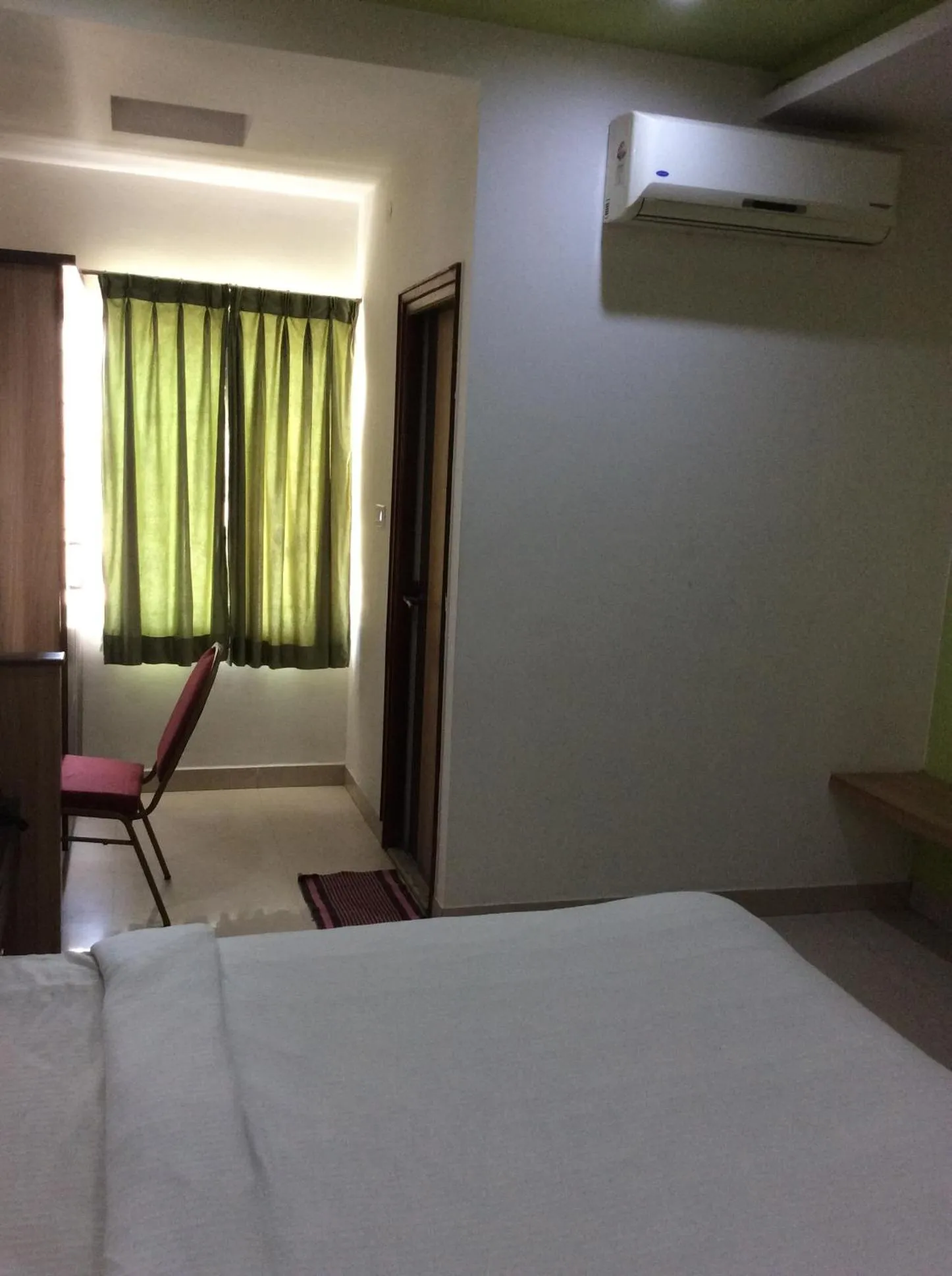 Bed in HOTEL SRI VAARI RESIDENCY