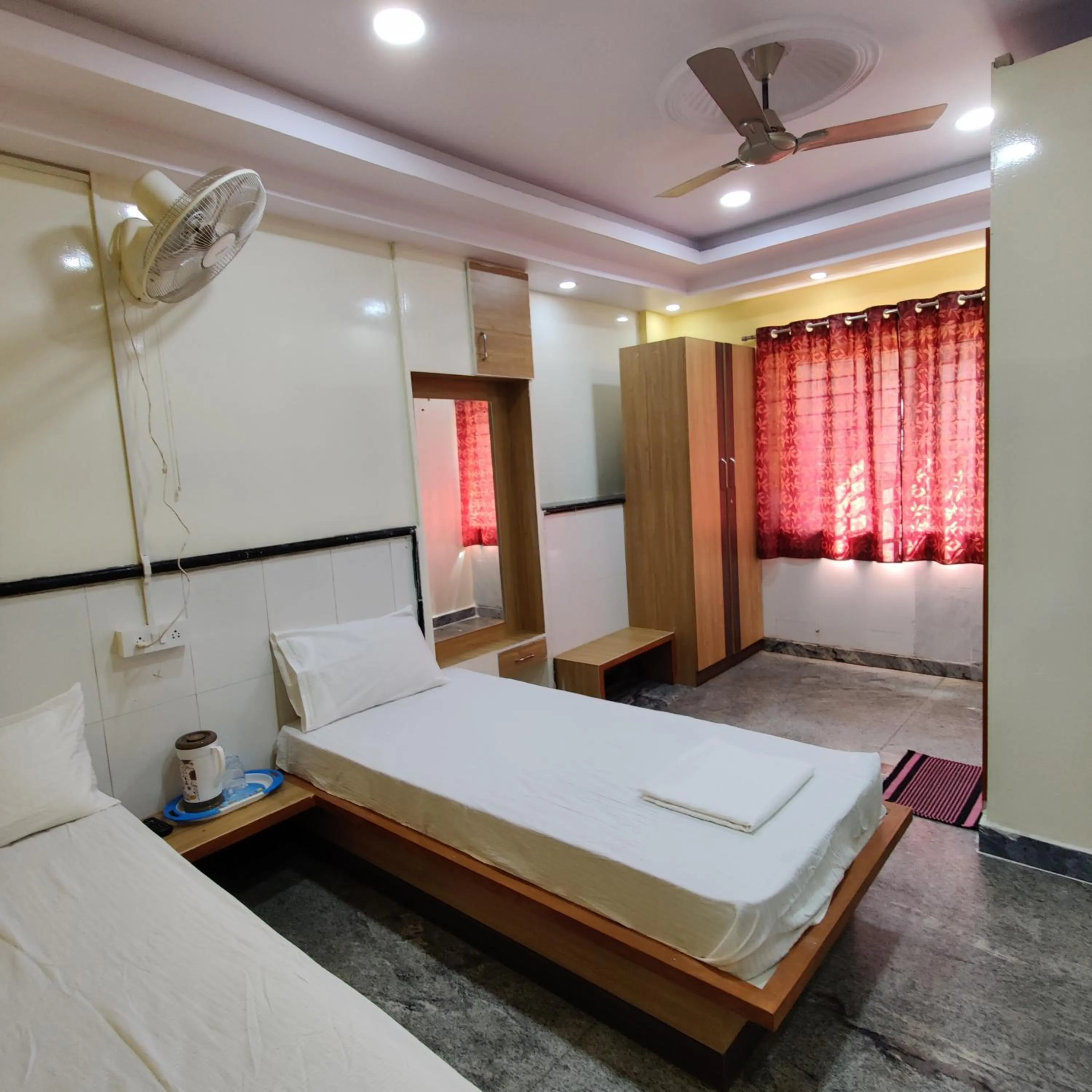 Photo of the whole room, Bed in HOTEL SRI VAARI RESIDENCY