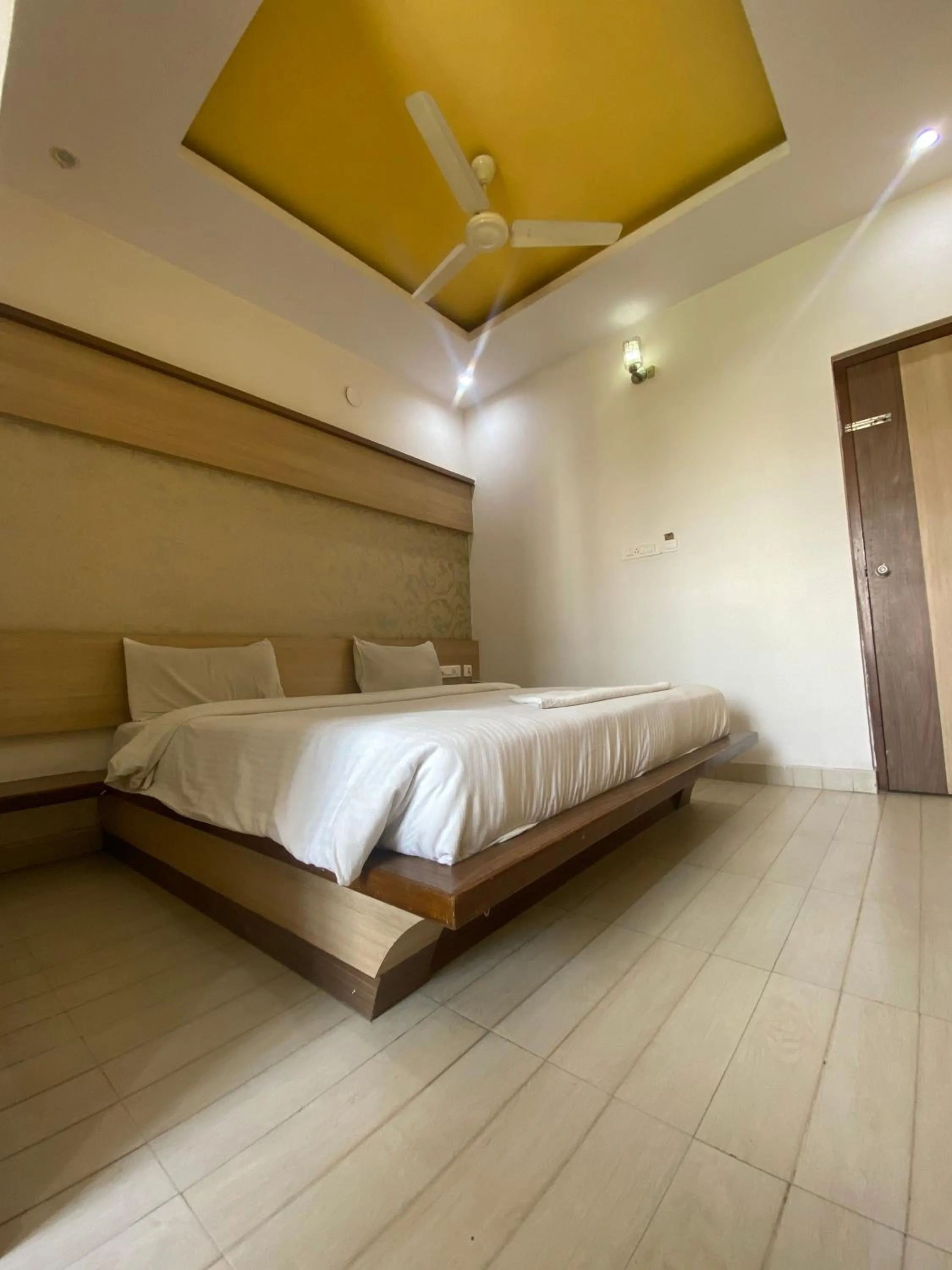 Photo of the whole room, Bed in HOTEL SRI VAARI RESIDENCY