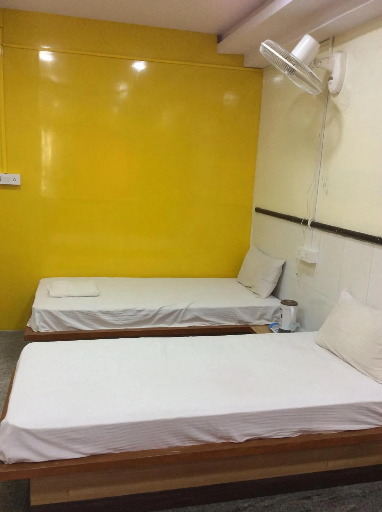 Bed in HOTEL SRI VAARI RESIDENCY
