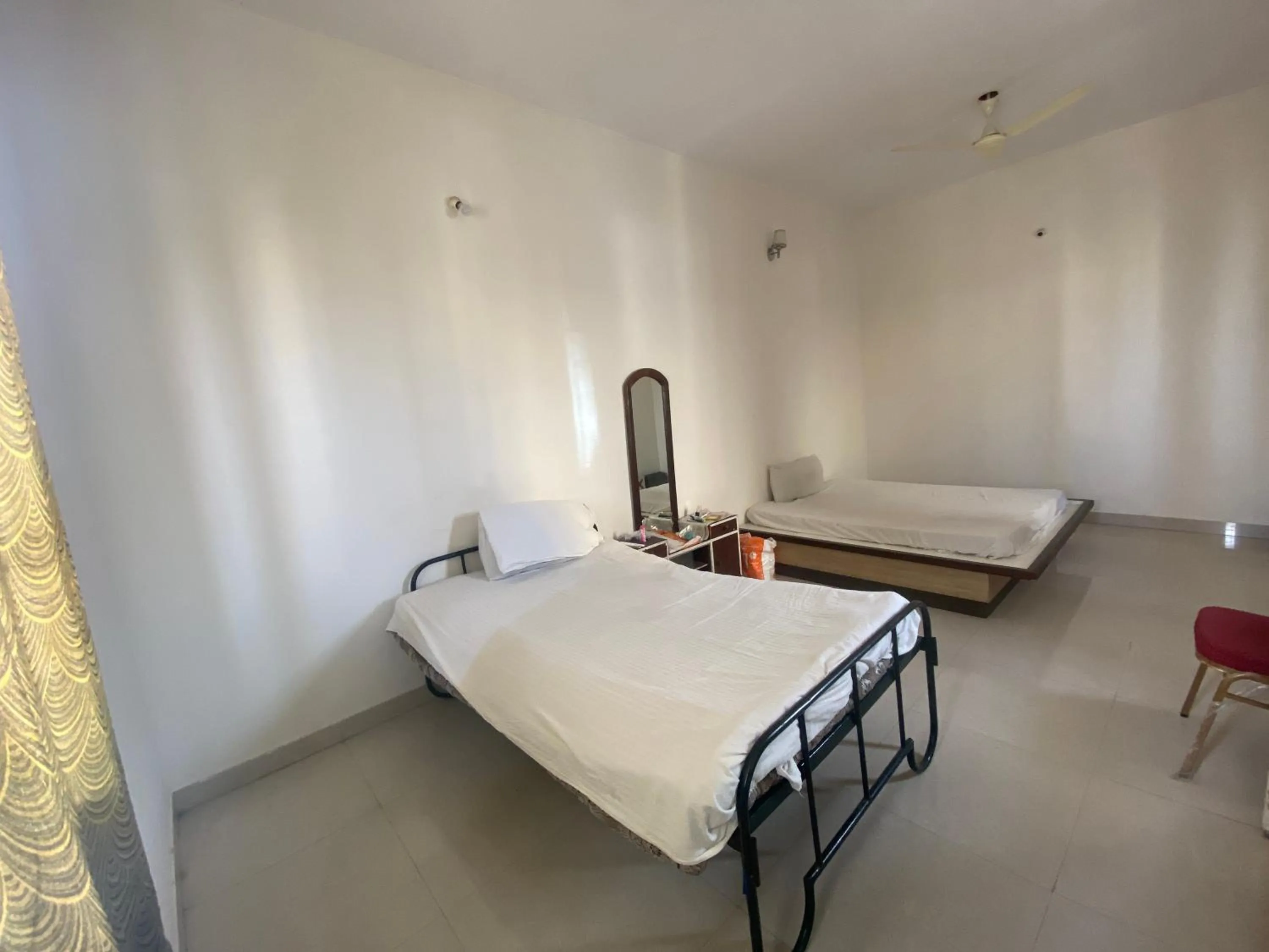 Bed in HOTEL SRI VAARI RESIDENCY