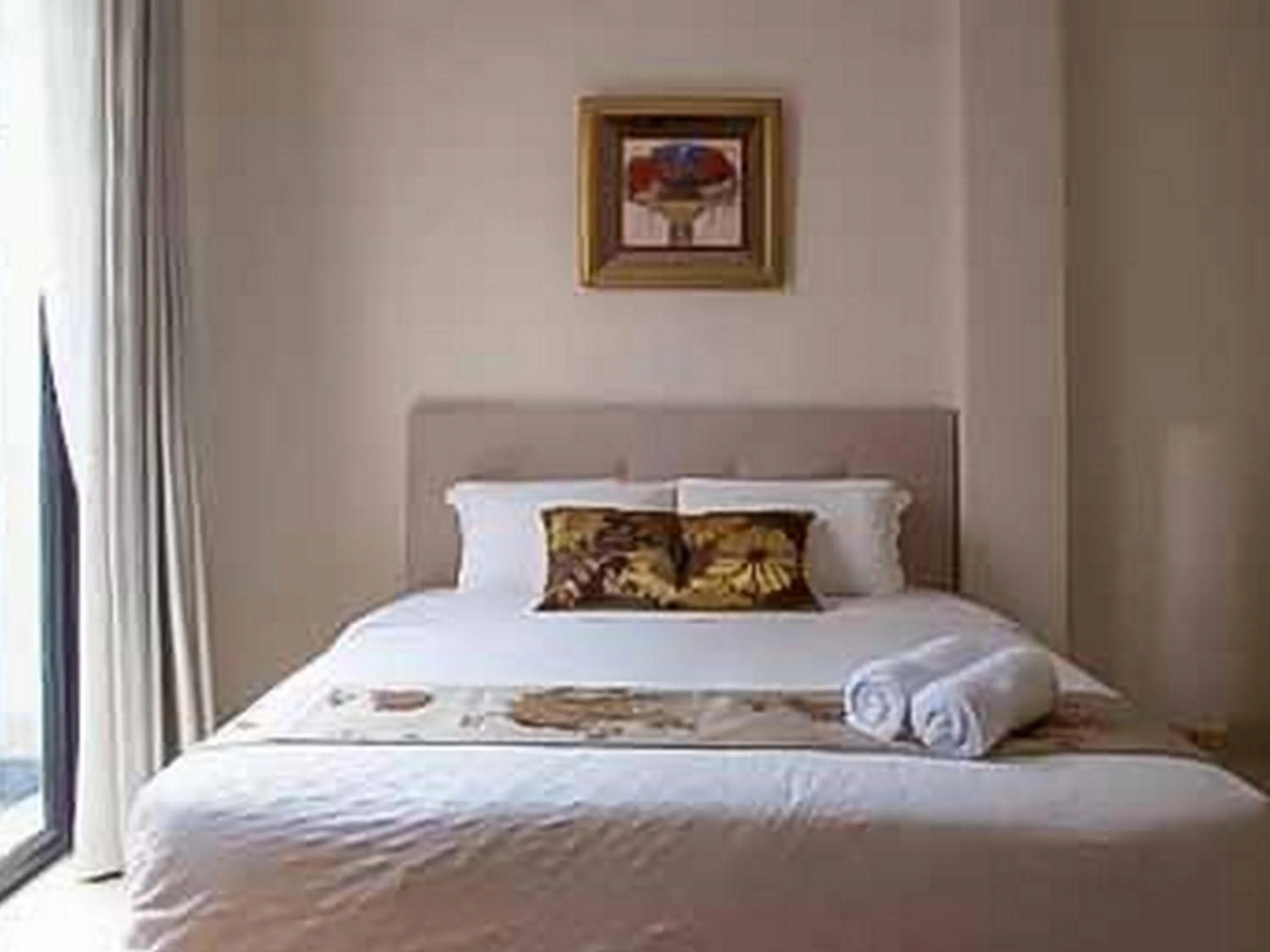 Bed in Bangka Suite Mitra RedDoorz