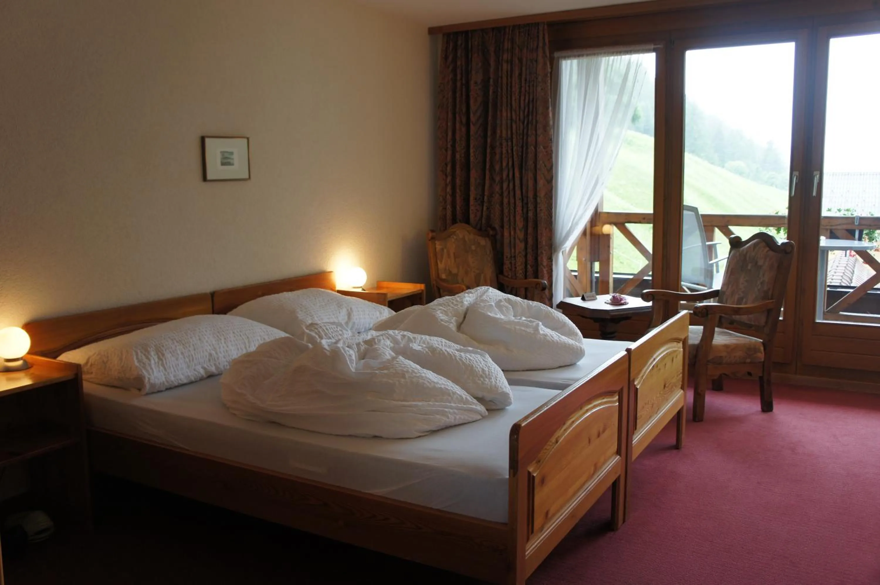 Bed in Hotel Alpenhof