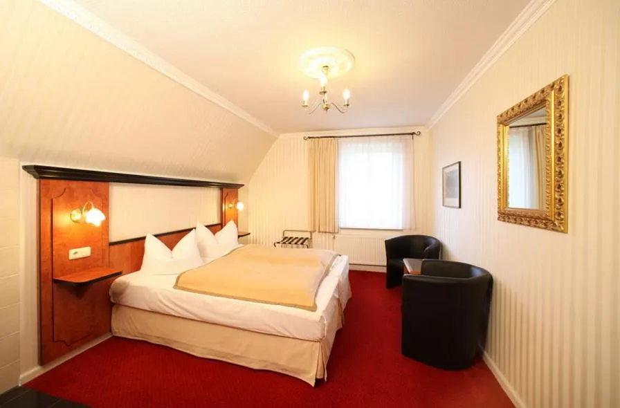 Bed in Gästehaus Plönlein - Hotel Goldener Hirsch Rothenburg