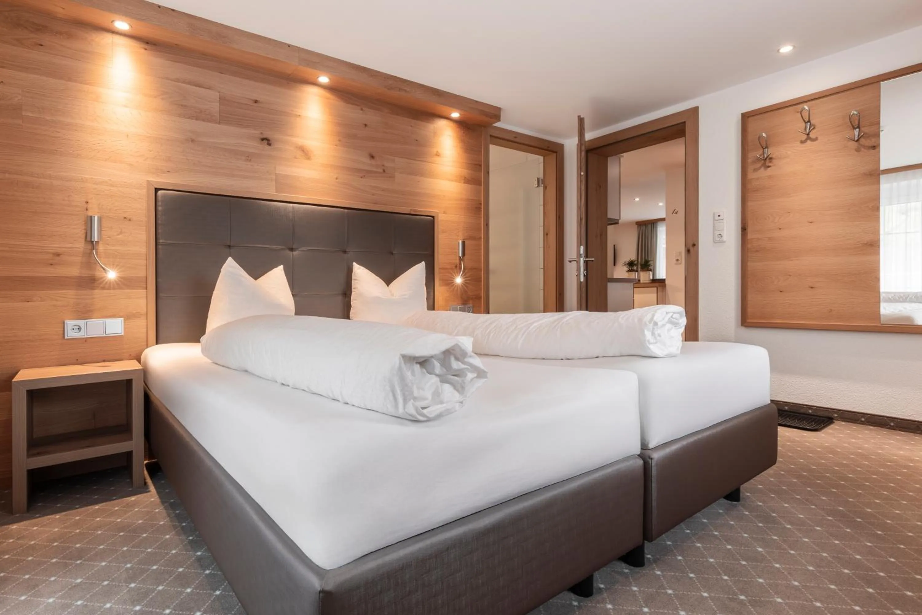 Bed in SCHMID Rooms & Apartments