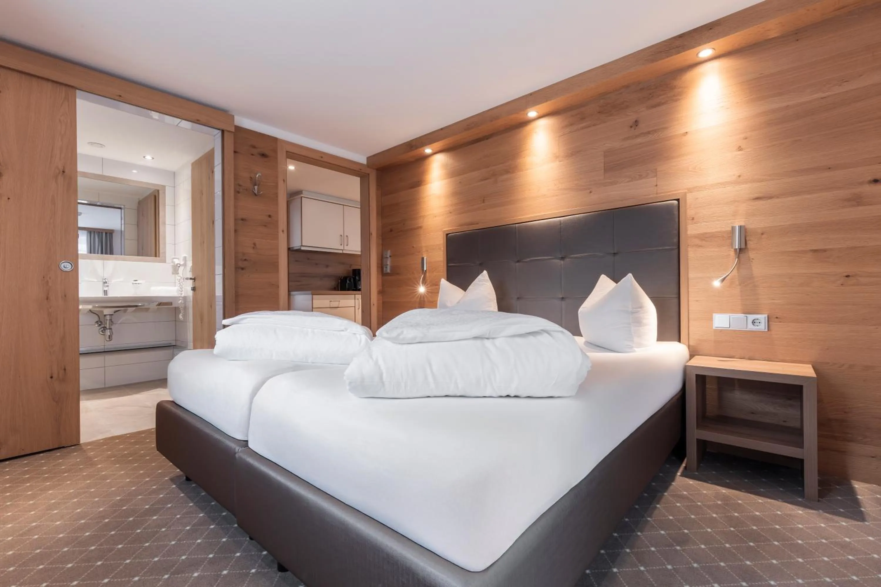 Bed in SCHMID Rooms & Apartments