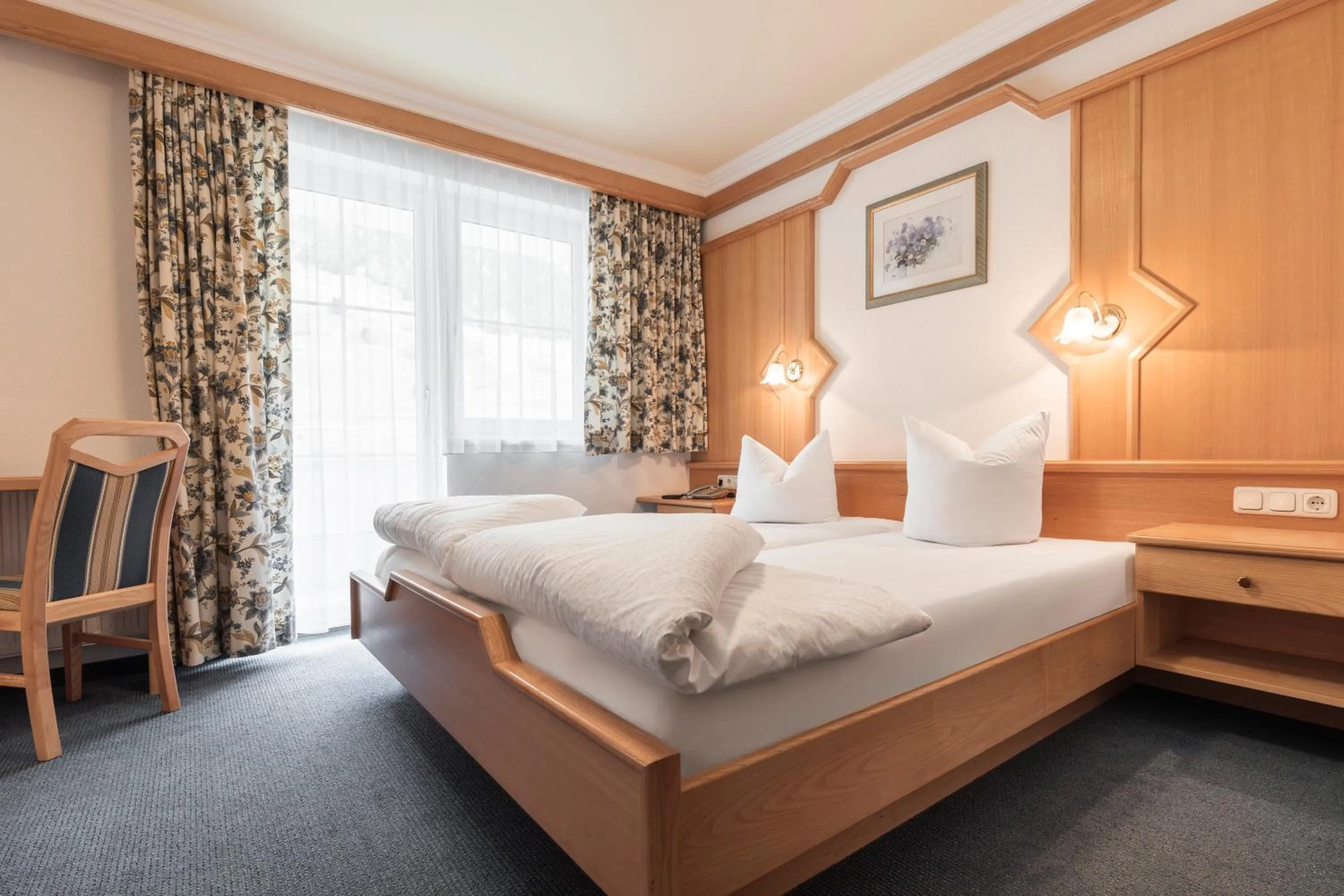 Bed in SCHMID Rooms & Apartments