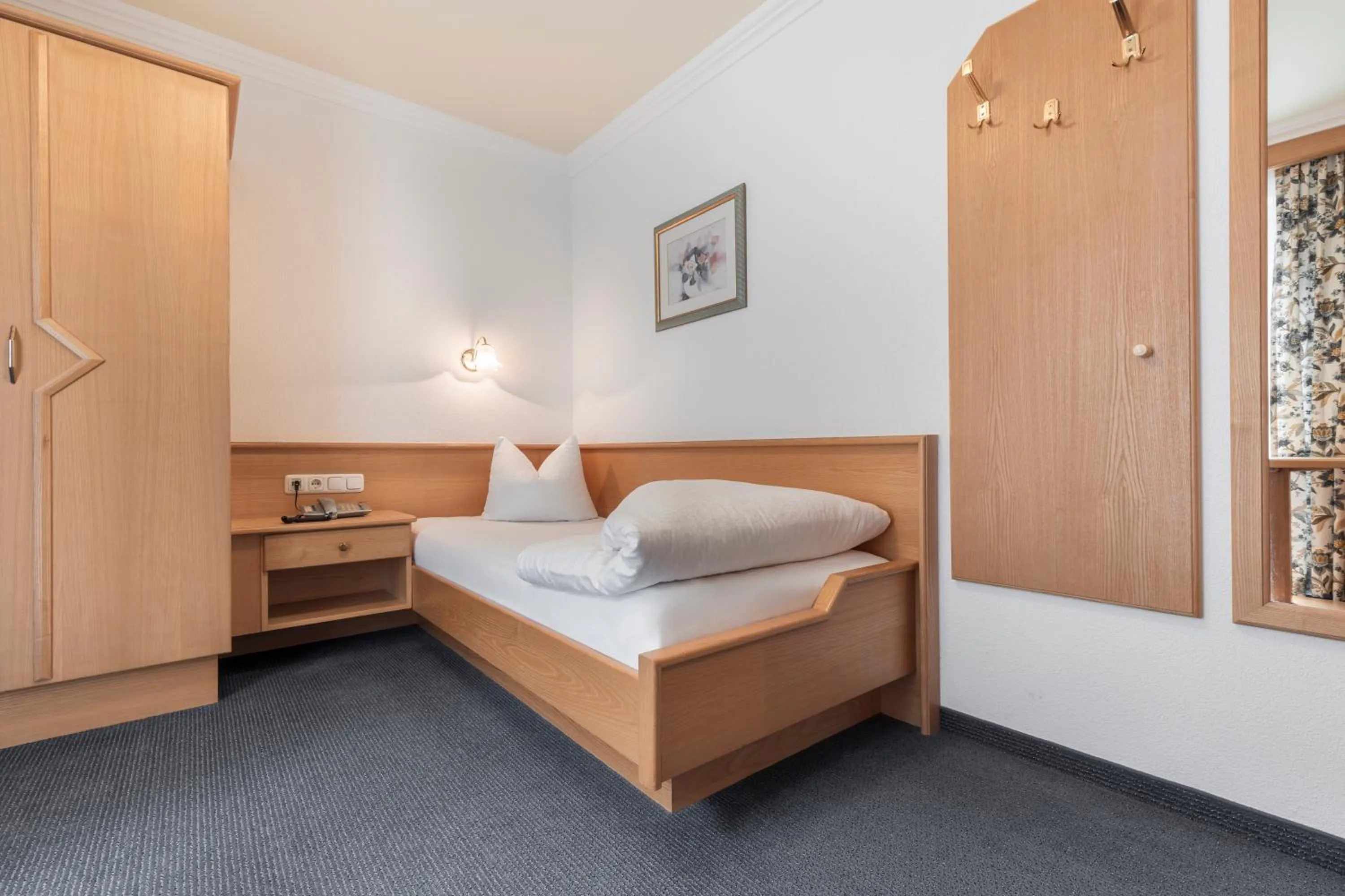 Bed in SCHMID Rooms & Apartments