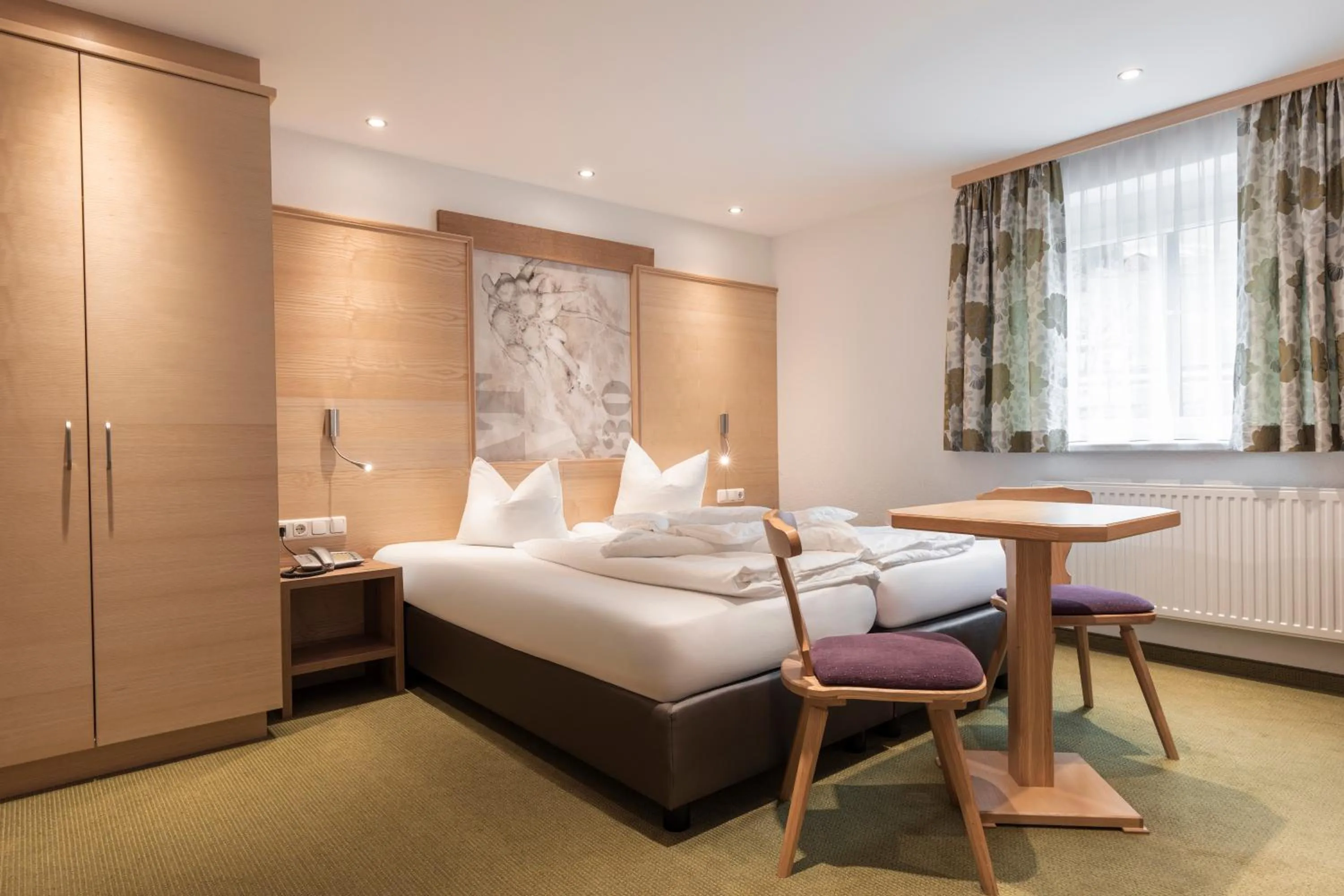 Bed in SCHMID Rooms & Apartments