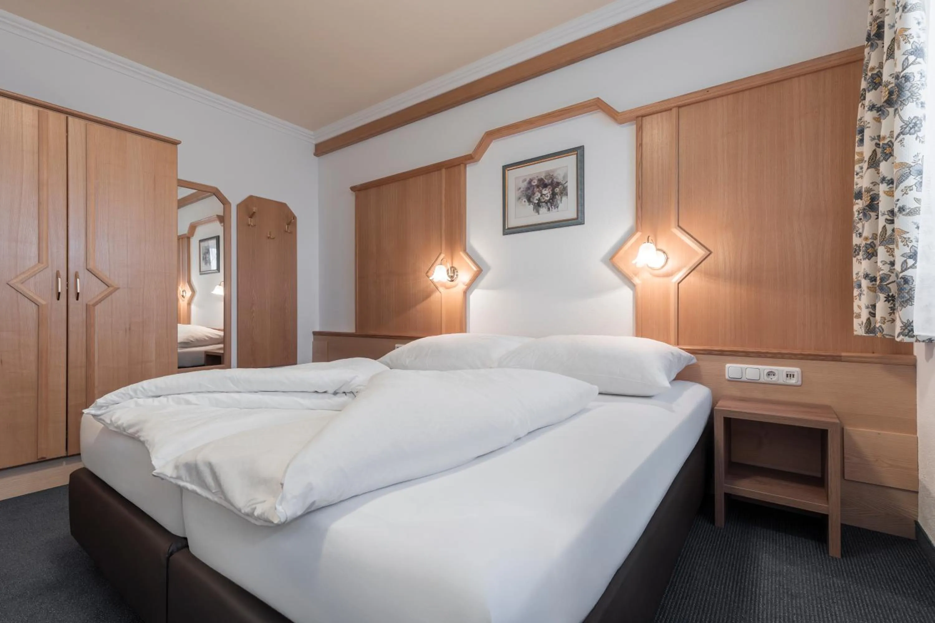 Bed in SCHMID Rooms & Apartments