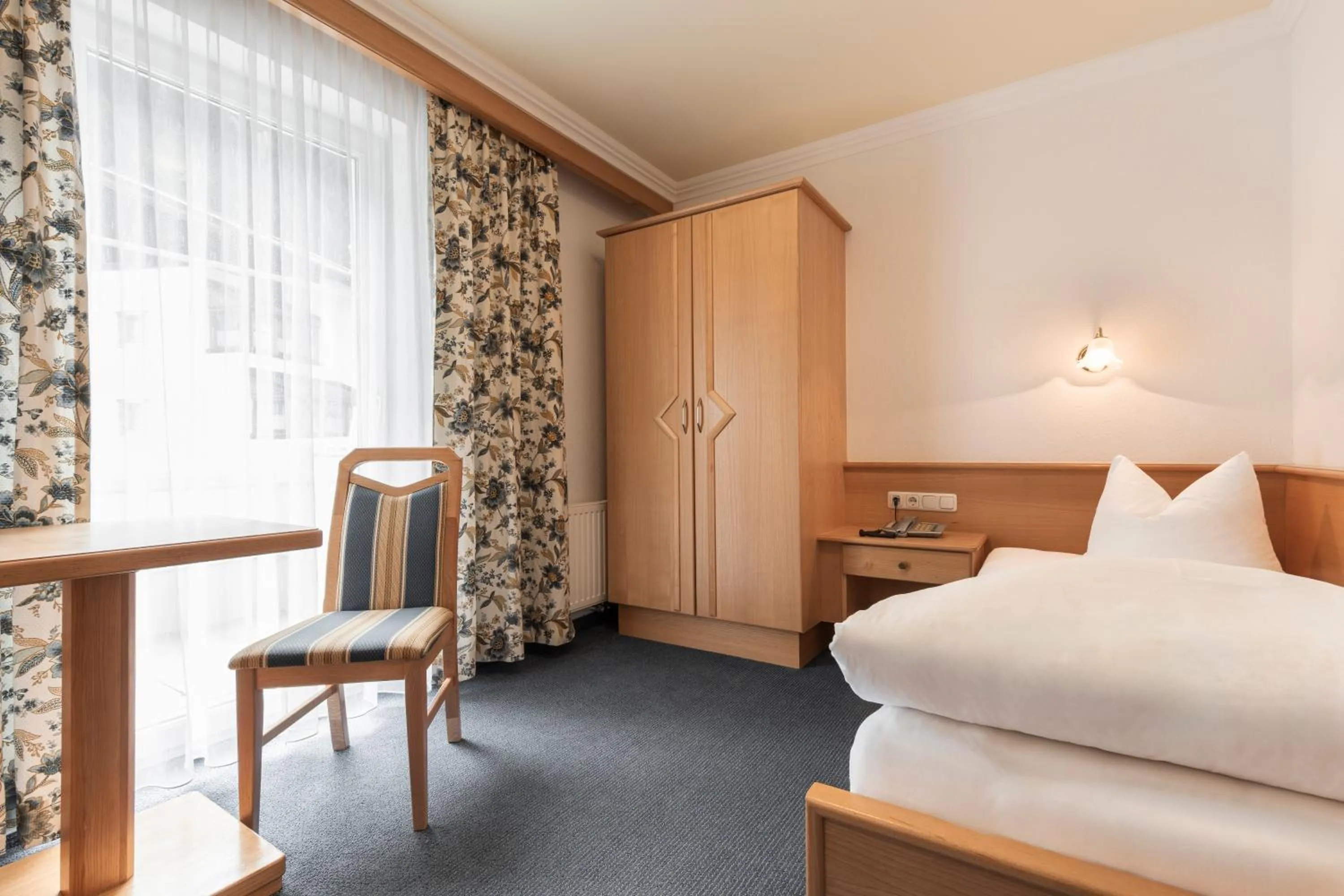 Bed in SCHMID Rooms & Apartments